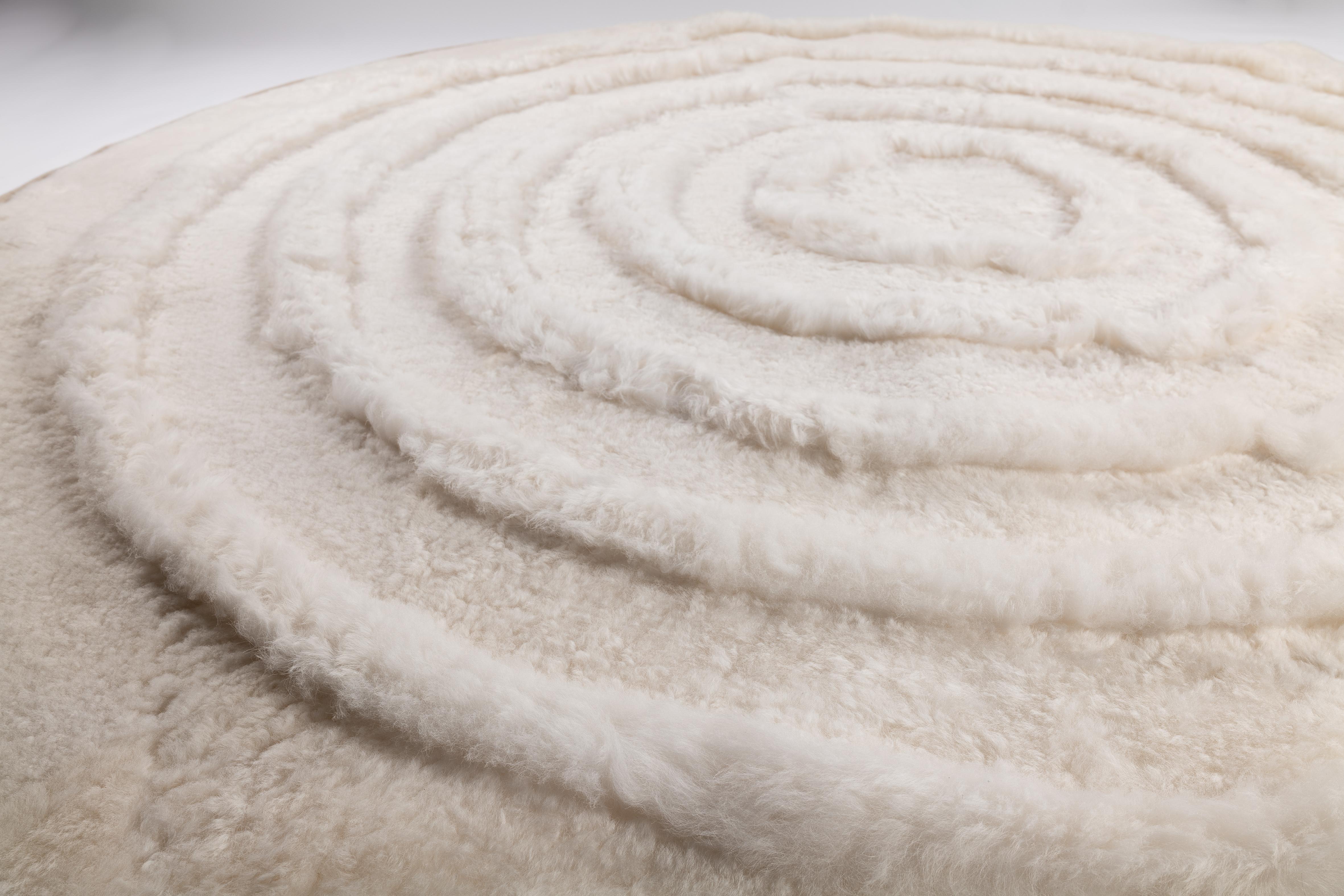 Our Eupraxia rug is a wonderful piece : every element exceptionally placed, every seam thoroughly inspected, and every inch intricately examined.
Handmade in France in our warehouse, our Creations redefined how lambskin can be used in custom