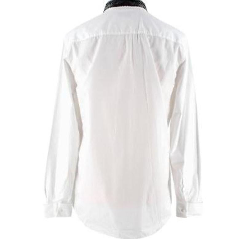 Givenchy White Shirt with Beaded Embellished Collar
 

 - Lightweight and soft cotton 
 - Delicate black beads scattered around the shirt collar
 - White front button stand 
 - Turned up buttoned cuffs 
 

 Materials: 
 Shell: 100% Cotton
 Beads: