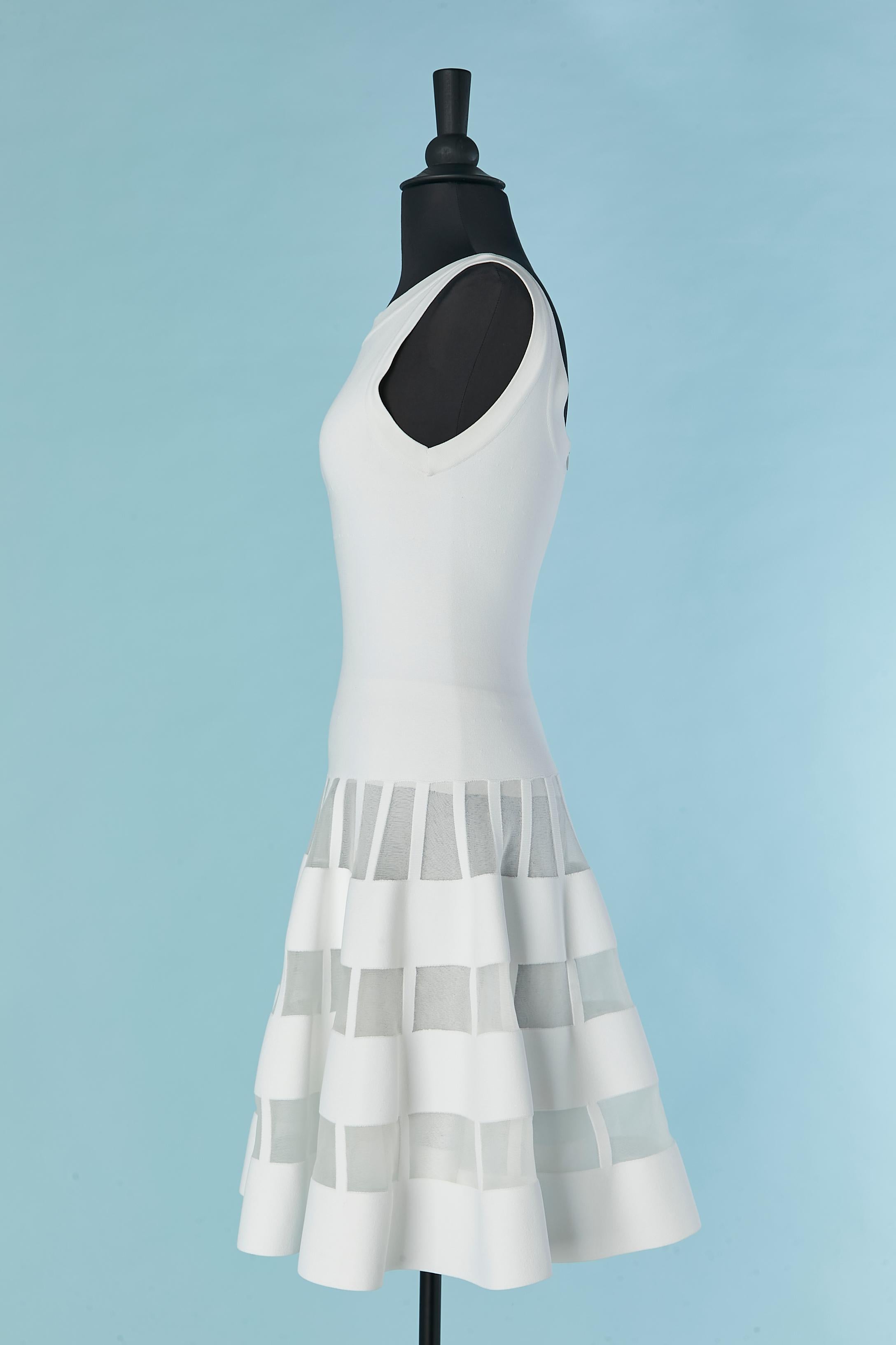 Women's White sleeveless cocktail dress with see-through lines on the skirt AlaÏa