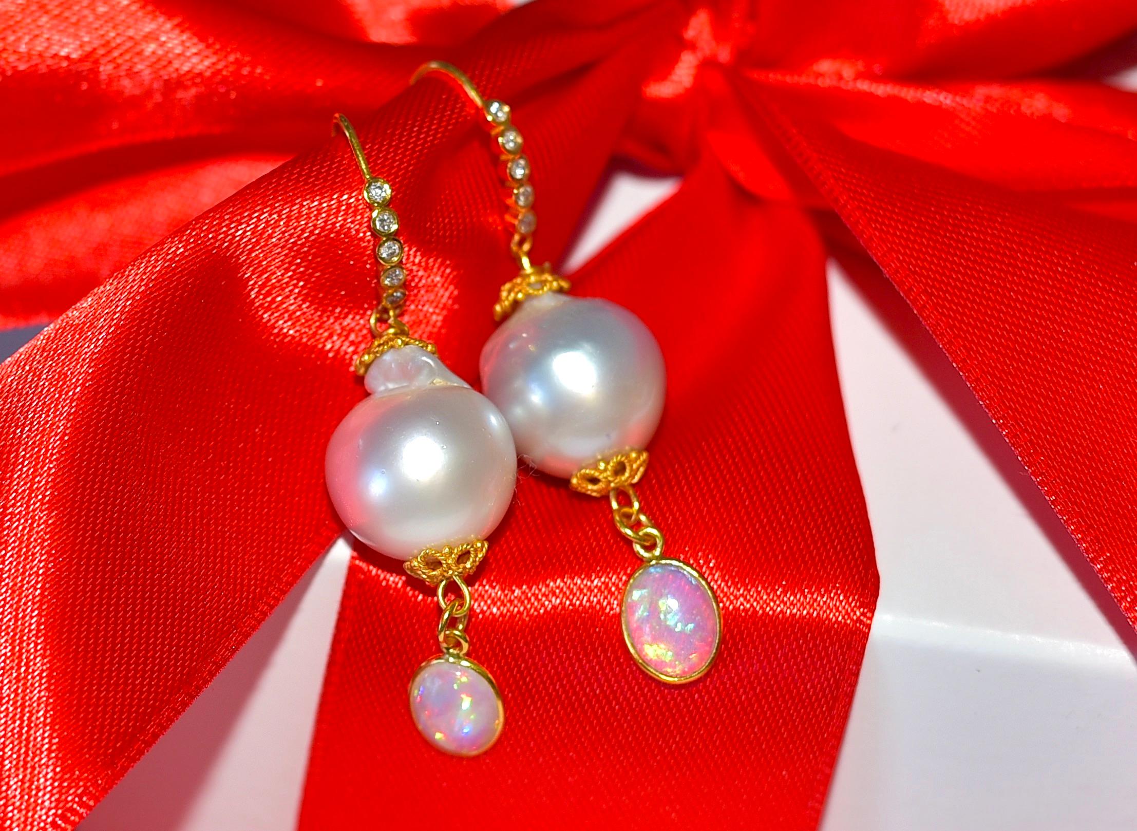 
Classic white South Sea Baroque Pearl earrings, in which I added bezel drops with natural Opal. The earrings are full of luxury because the ear wire with diamond accents gives elegance to the earring.
They are not the smallest either, you can