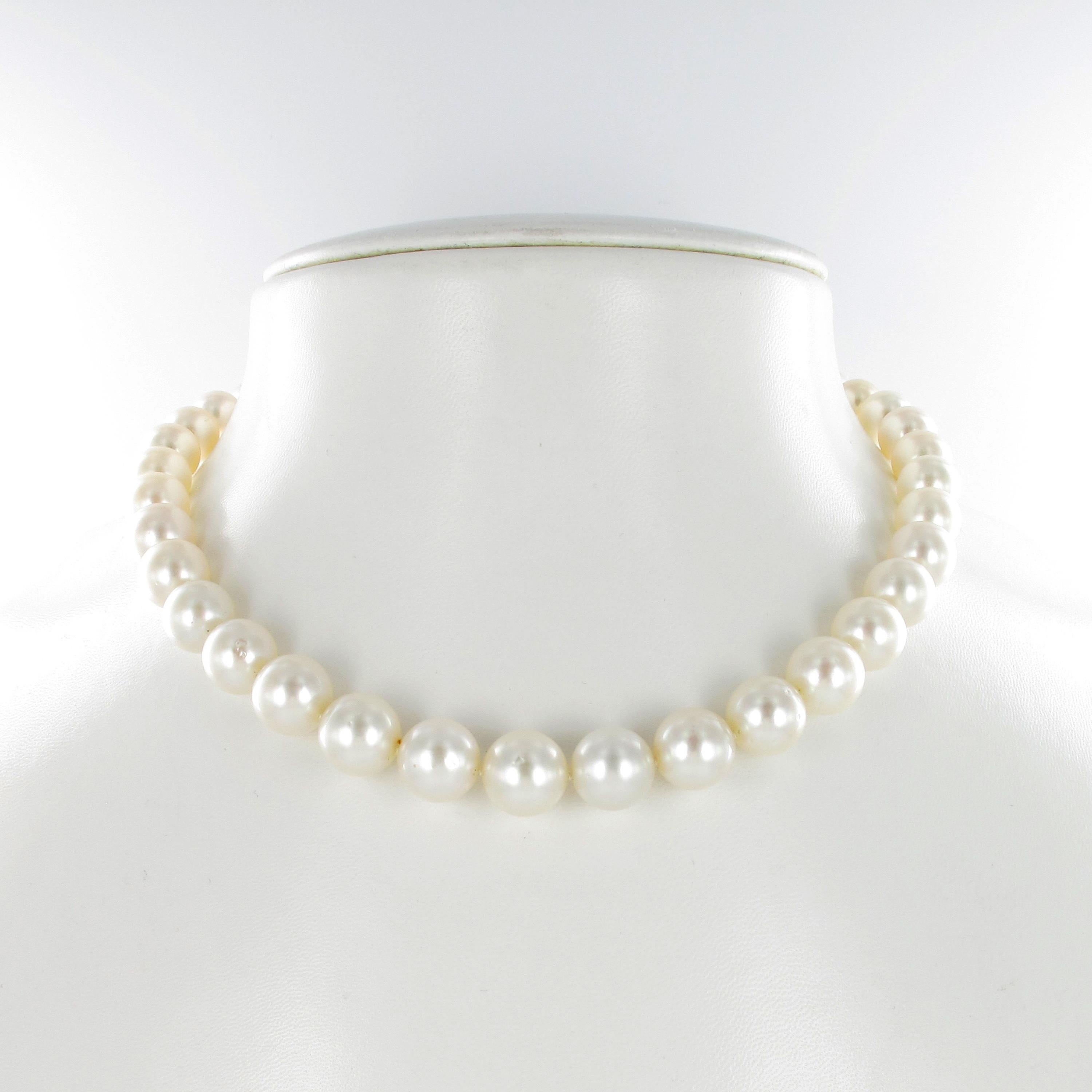 This strand consists of 38 slightly cream colored round South Sea cultured pearls from 9.1 mm to 12.0 mm, good luster.
The ball clasp is manufactured in 18 karat polished yellow gold. 

Accompanied by Gubelin GemLab Report No. 14010176
Length: 42.0