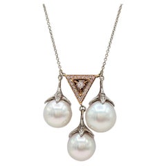 Collier de perles blanches des mers du Sud et de diamants en or bicolore 18K