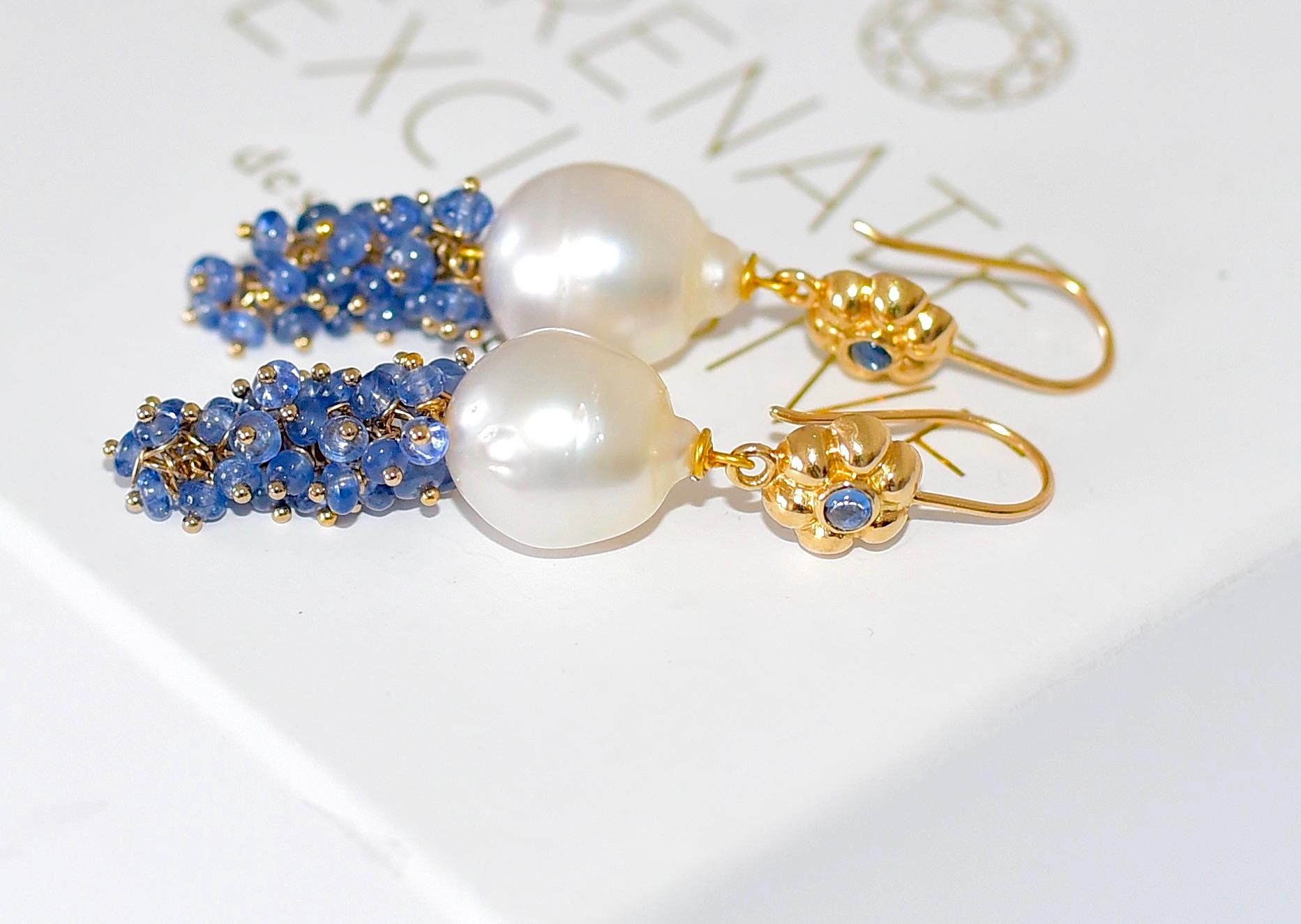 
A truly beautiful and luxurious pair of earrings for elegant days! Something for blue lovers!

Made of: No Heat, unheated, untreated Burmese Cornflower Natural Blue Sapphire Smooth Rondelle Beads, 3-4mm
White South Sea Cultured Baroque Pearl; 13.3