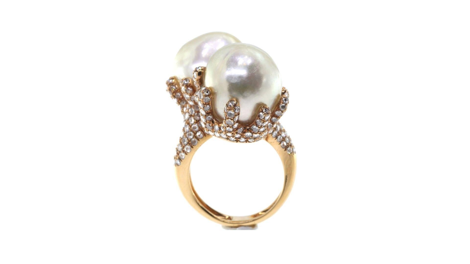 
This is a unique South sea Pearl ring with 328 small diamonds in Baroque style .  Its set in 18k Rose Gold and can be in white or yellow too. 

South Sea pearls are generally much larger than other pearl types and have a unique luster quality – a
