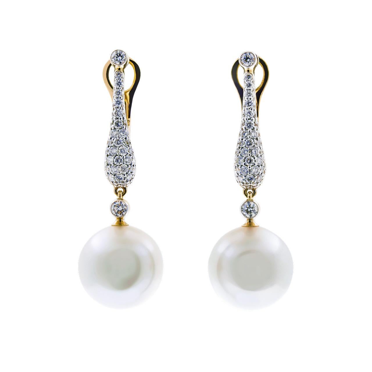 - 112 Round Diamonds – 1.12 ct, G/VVS1-VVS2
- 12.98 mm White South Sea Pearl
- 18K Yellow Gold 
- Weight: 11.07 g
These fabulous earrings from the Pearl dreams collection features two lustrous White South Sea pearls of 12.98 mm diameter. The design