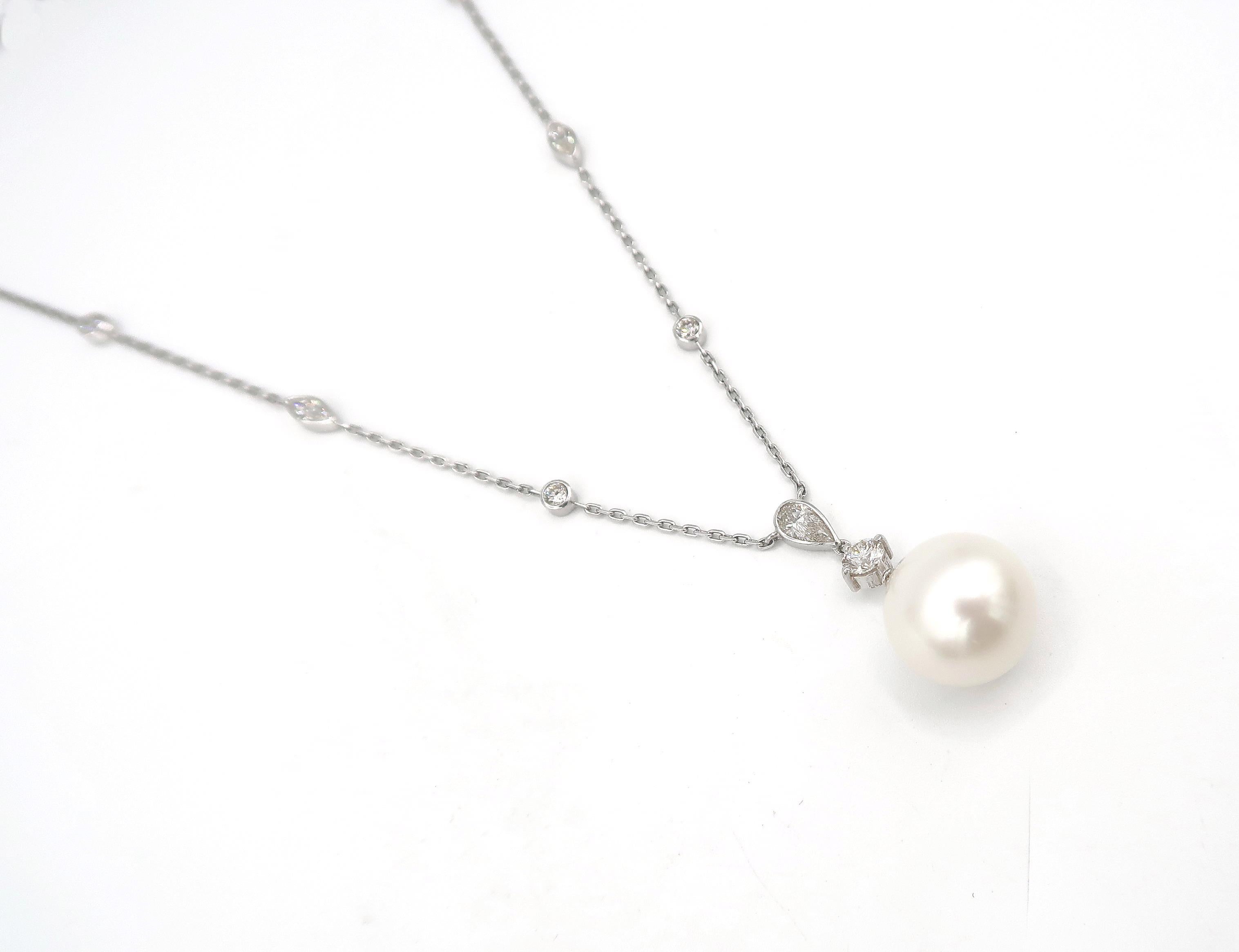 White South Sea Pearl Drop and Mixed Cut Diamond 18 Karat White Gold Chain Necklace

Gold: 18K 11.002g.
Pearl: White South Sea 1pc. Approx. 14 mm.
Diamond: 2.11cts.