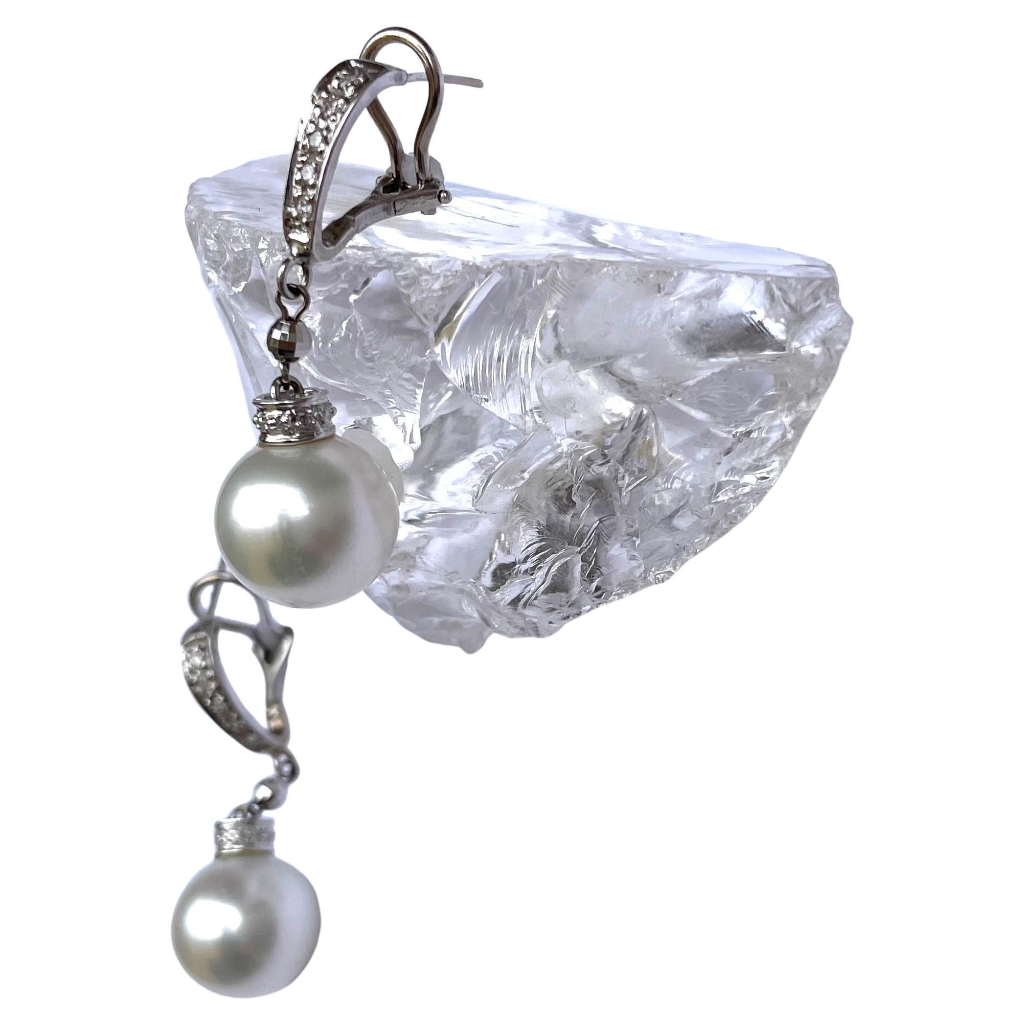 Description
Stylish exquisite South Sea pearls earrings with diamonds
Item # E1034

Materials and Weight
South Sea pearls 12.4mm, round
Diamonds
Posts and omega backs 14k white gold
14k white gold

Dimensions
Length 2 inches

Made in Newport Beach,