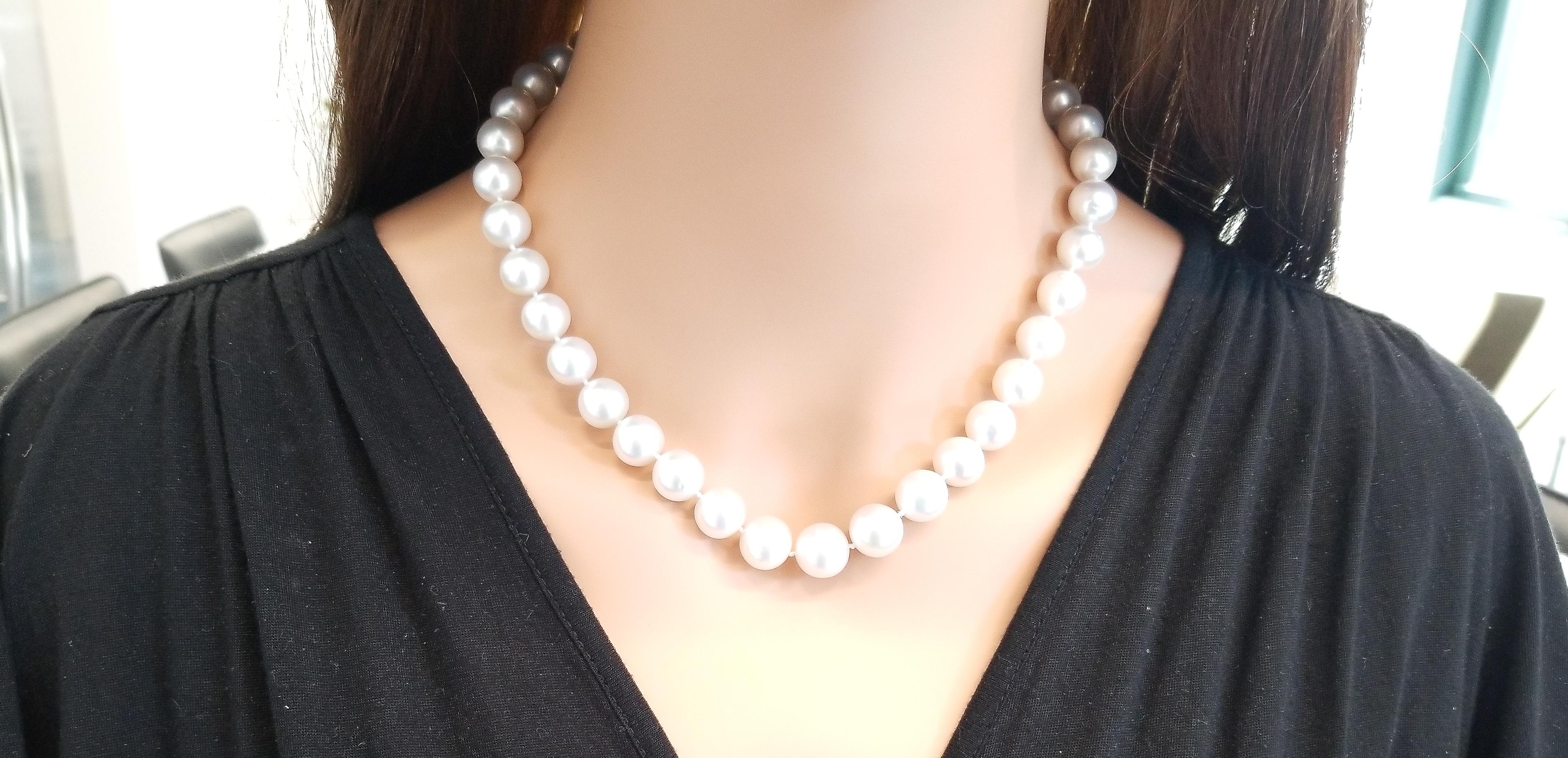 Highly sought after for their incredible luster, South Sea pearls are an elegant and stylish addition to your look. This stunning strand of ivory white South Sea pearls feature 9.5-12.75 millimeter pearls. The silk strand is knotted between each