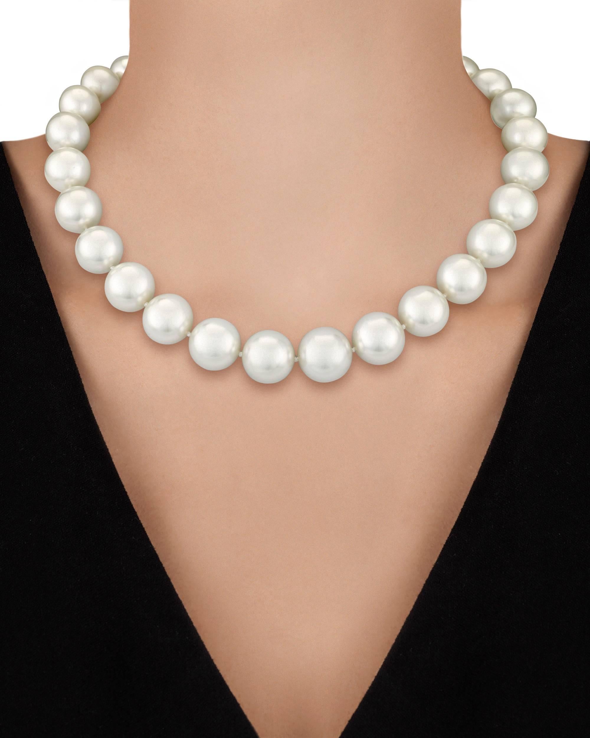 This eye-catching necklace of 27 lustrous, graduated white South Sea pearls is simply amazing. These perfectly matched, graduated orbs range in size from 14mm to 16mm, and are secured with an 18K white gold clasp studded with 0.75 ctw. of white