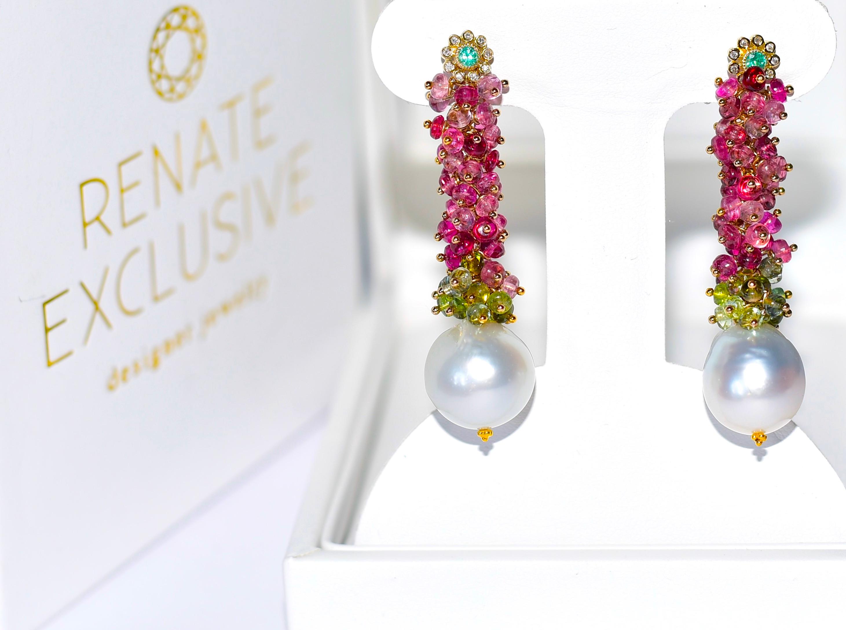 A pair of unique multi-color faceted Brazilian Tourmaline beads, HUGE White South Seal Pearl (14,5mm x 15,7mm) earrings in 14k Solid Yellow Gold Natural Emerald Diamond Halo Flower Ear Studs. 
Another beautiful long tourmaline earring from Renate