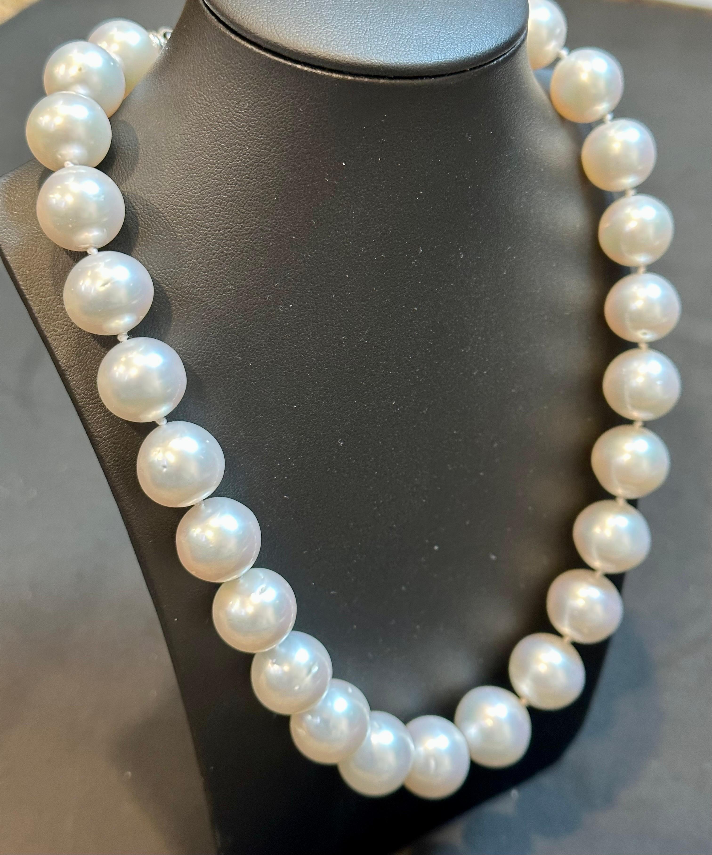 The white South Sea pearl measures between 15 and 17.5 millimeters in diameter. It has a round shape with a smooth and lustrous surface. The pearl has a white color with a hint of silver overtone, which adds to its elegant and sophisticated
