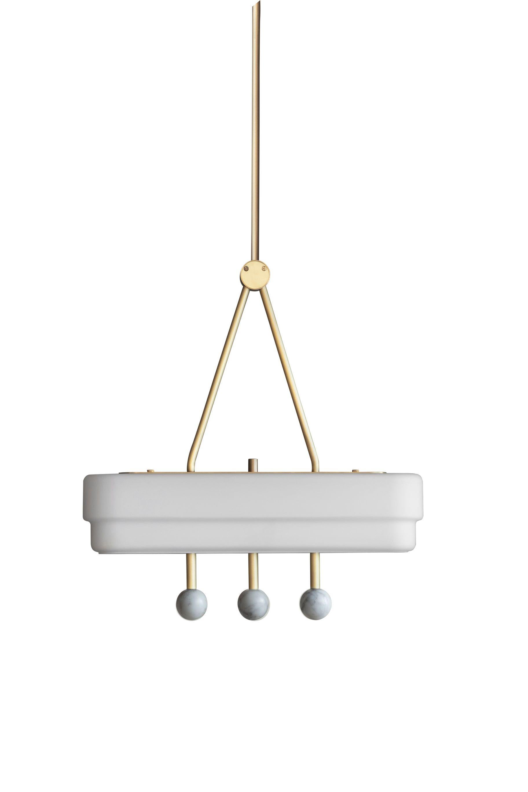 White Spate pendant by Bert Frank
Dimensions: H 44 x W 9 x D 44 cm
Materials: Brass, marble, glass

Available finishes: Bronzed brass, black brass
All our lamps can be wired according to each country. If sold to the USA it will be wired for the