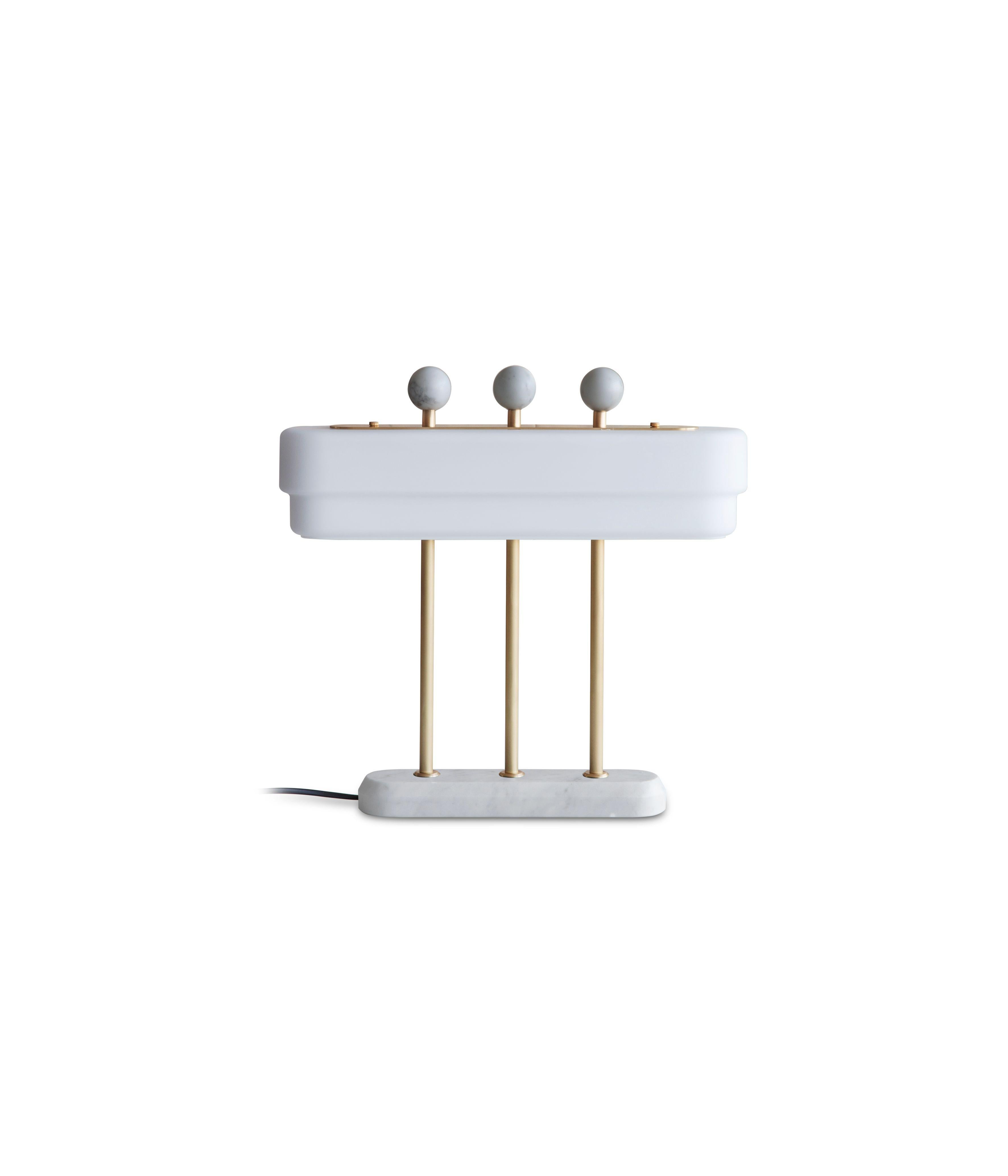 White spate table lamp by Bert Frank.
Dimensions: H 40 x W 9 x D 44 cm.
Materials: brass, marble and glass.


All our lamps can be wired according to each country. If sold to the USA it will be wired for the USA for instance.

When Adam Yeats