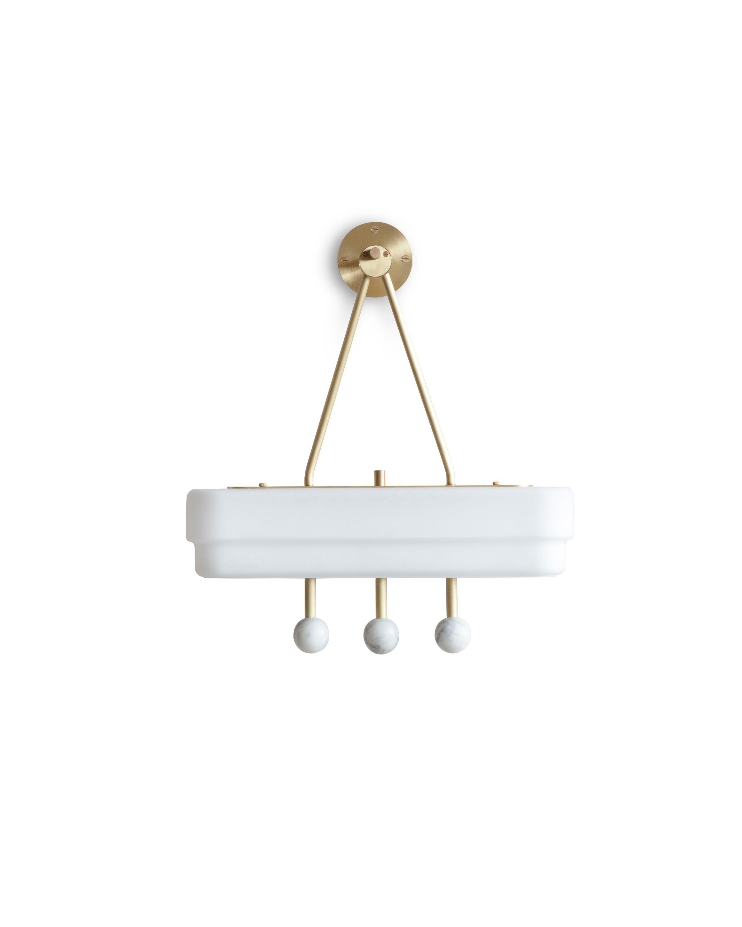 White Spate wall light by Bert Frank
Dimensions: H 47 x W 44 x D 13.6 cm
Materials: Brass, marble, glass

Available finishes: Bronzed brass, black brass
All our lamps can be wired according to each country. If sold to the USA it will be wired
