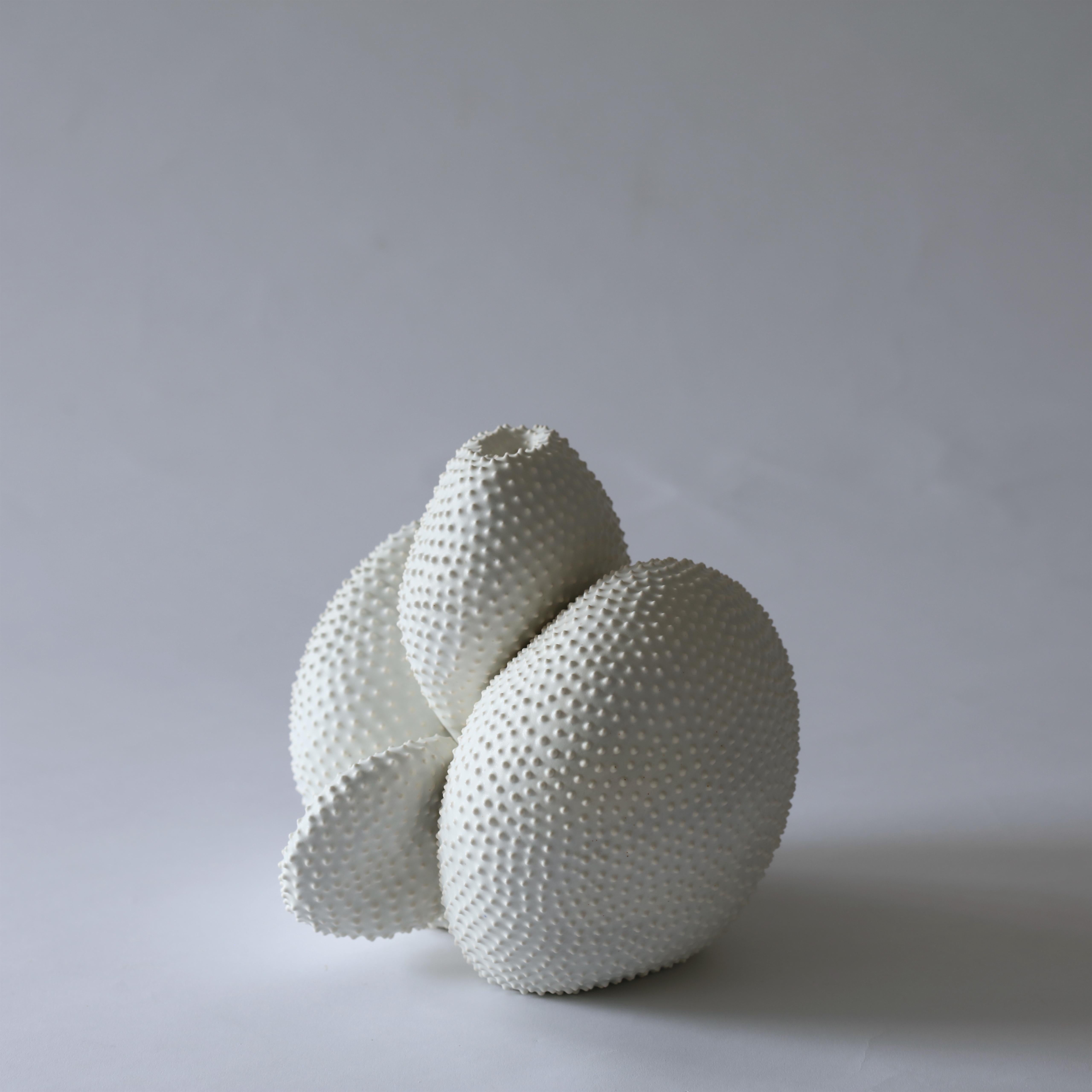 Cactus Vessel I, 2023, (Ceramic, C. 7.9 in. h x 8.7 in. w x 8.5 in. d, Object No.: 4168)

There is a clear connection between the consistency that Skov Madsen establishes in her research of surfaces, material and ornamentalism, and her efforts that