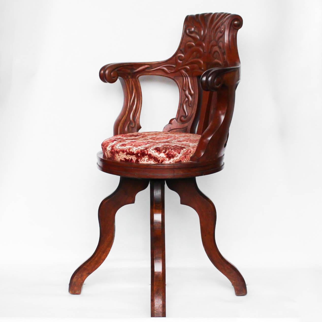 A solid, carved, walnut saloon chair from HMHS Britannic, sister ship to the Titanic.


   