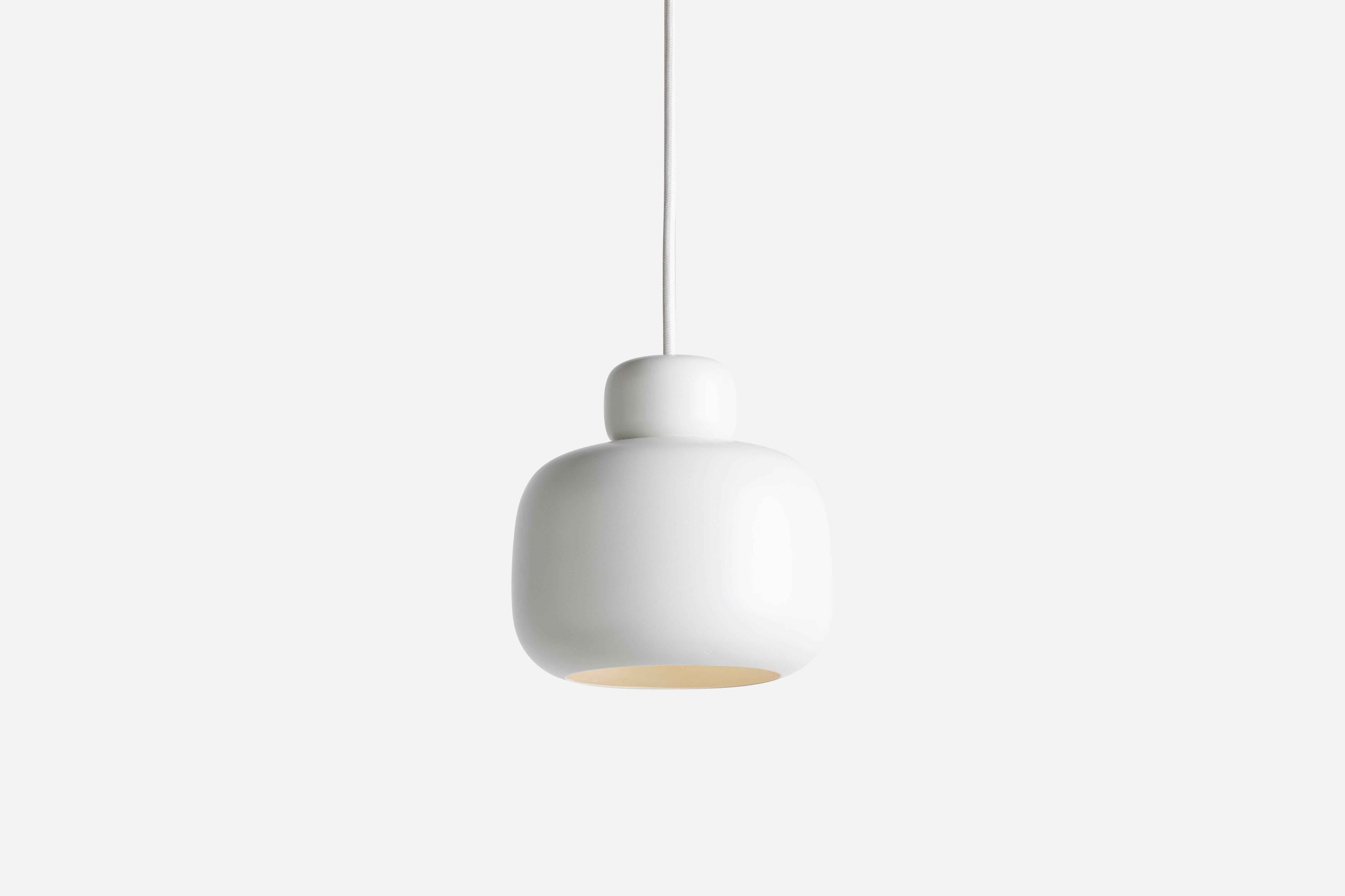 White stone pendant lamp by Philip Bro
Materials: metal.
Dimensions: D 15.9 x H 16 cm
Available in yellow, white and black.

Philip Bro is an experienced Danish designer with a drive to prove that serious design can still be stylish, playful