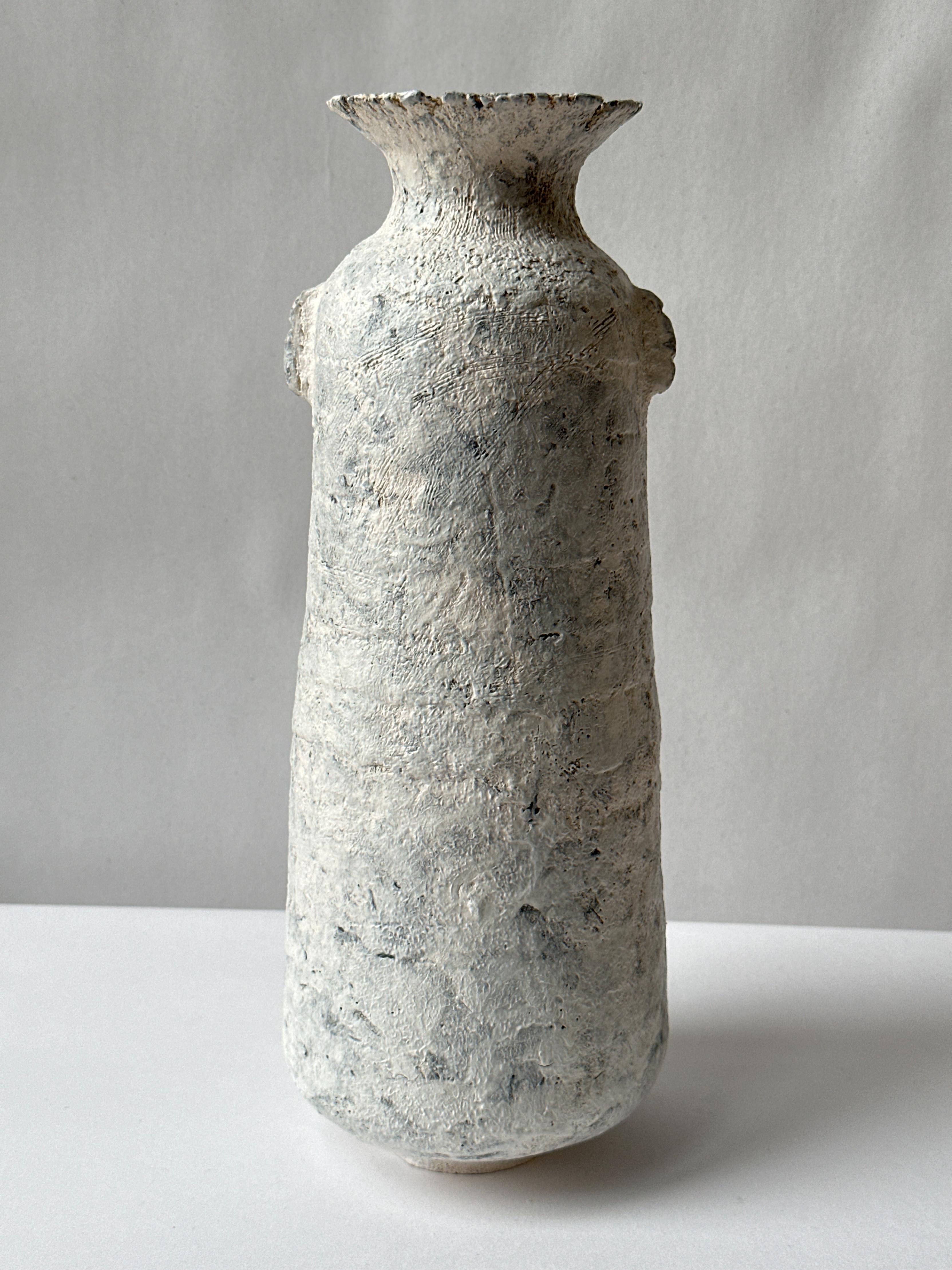 White Stoneware Alavastron Vase by Elena Vasilantonaki
Unique
Dimensions: ⌀ 20 x H 40 cm (Dimensions may vary)
Materials: Stoneware
Available finishes: White, Red, Black, Brown, Black, White Patina

Growing up in Greece I was surrounded by pottery