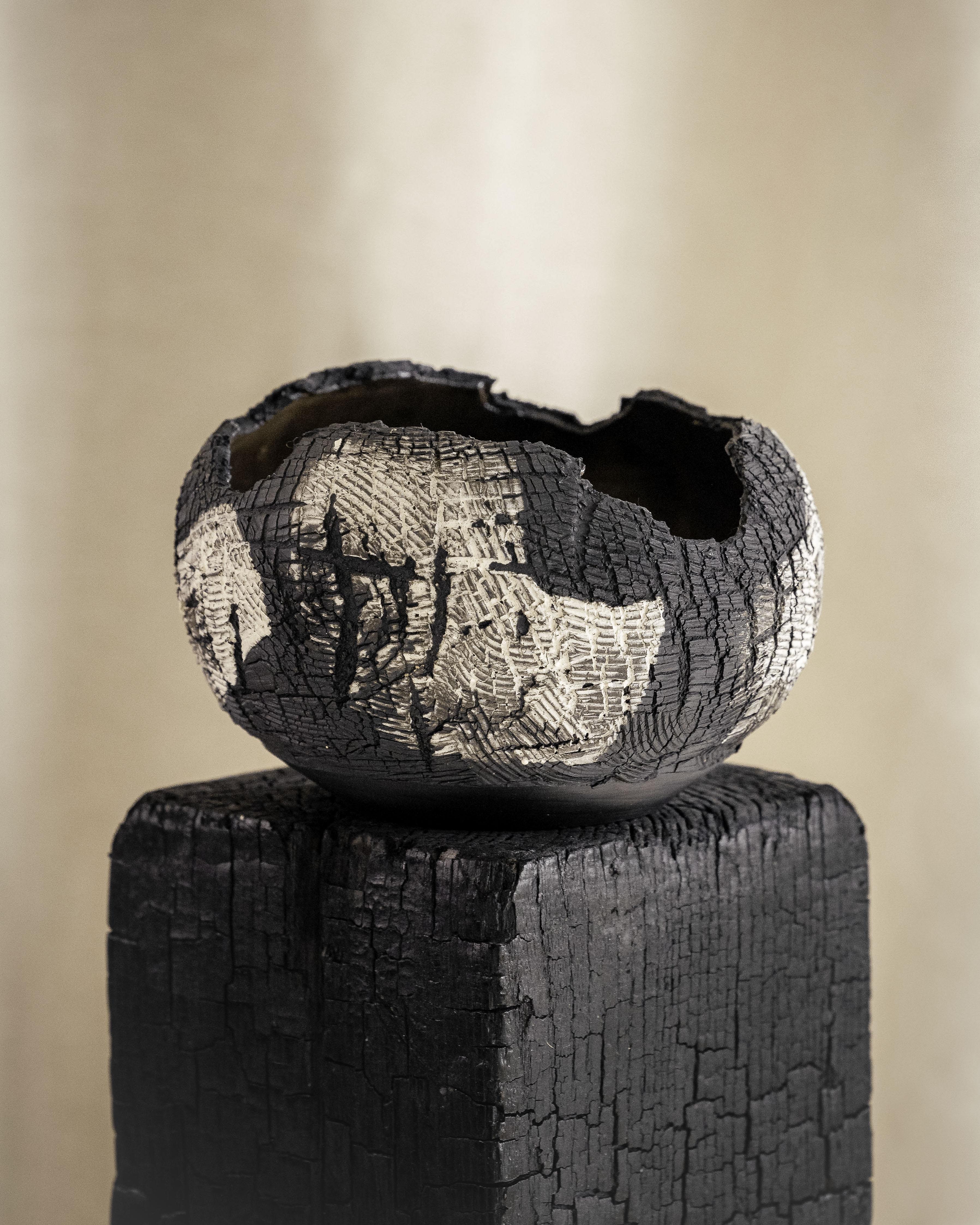 White Stoneware Lined, Distressed Form NO.3  by Alexandria Roby
Dimensions: D 17.78 x H 10.16 cm
Materials: Black and White Stoneware Lined with Bronze Glaze
Colors - Sandstone/Ivory, or Onyx/Ivory

My first interaction with clay was in 2011 as an