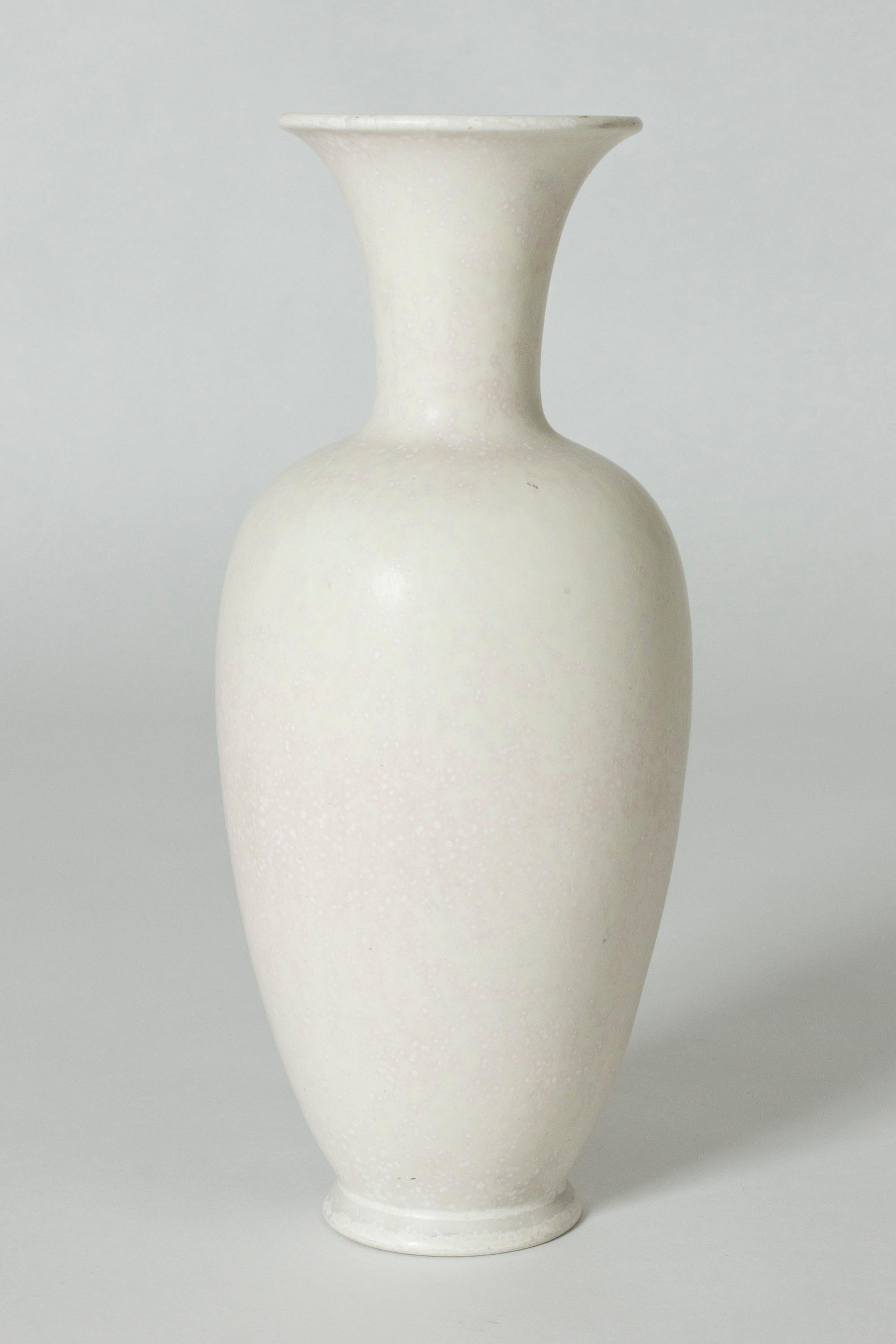 Beautiful stoneware vase by Gunnar Nylund, curvesome with a wide mouth. White glaze with subtle “Mimosa” flecks.
