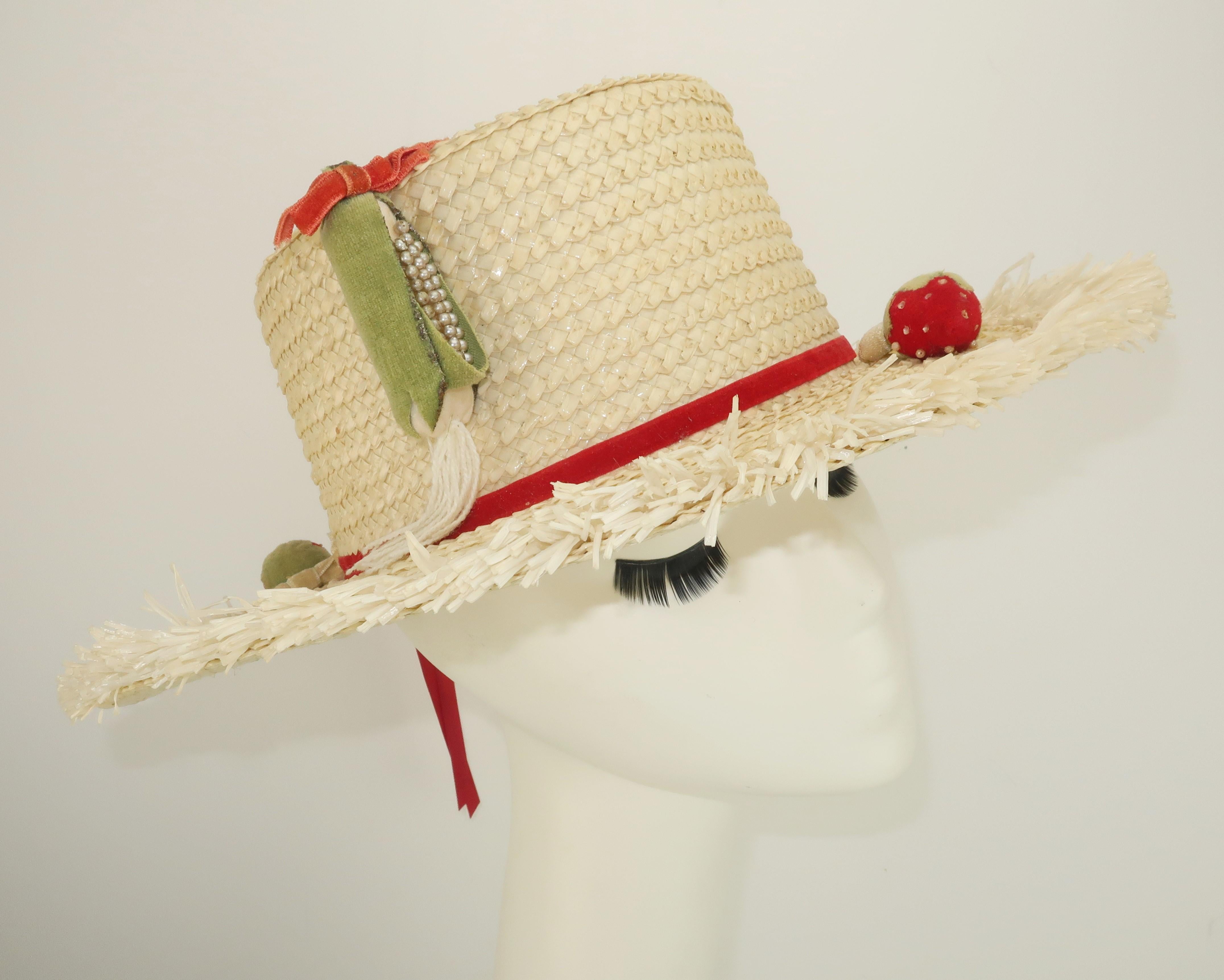 A blast from the 1950's Floridian past ... a vanilla white straw hat with a raffia trimmed brim and velvet decorations including strawberries and miniature corn cobs accented by pearl beads.  Novelty hats are a fun way to add a vintage touch to a
