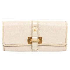 White Suhali leather Louis Vuitton Le Favori wallet with brass hardware