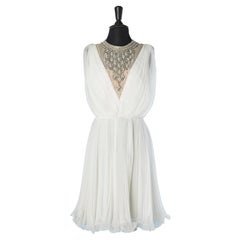 White sunray pleated cocktail dress with embroideries on neckline Jack Bryan 