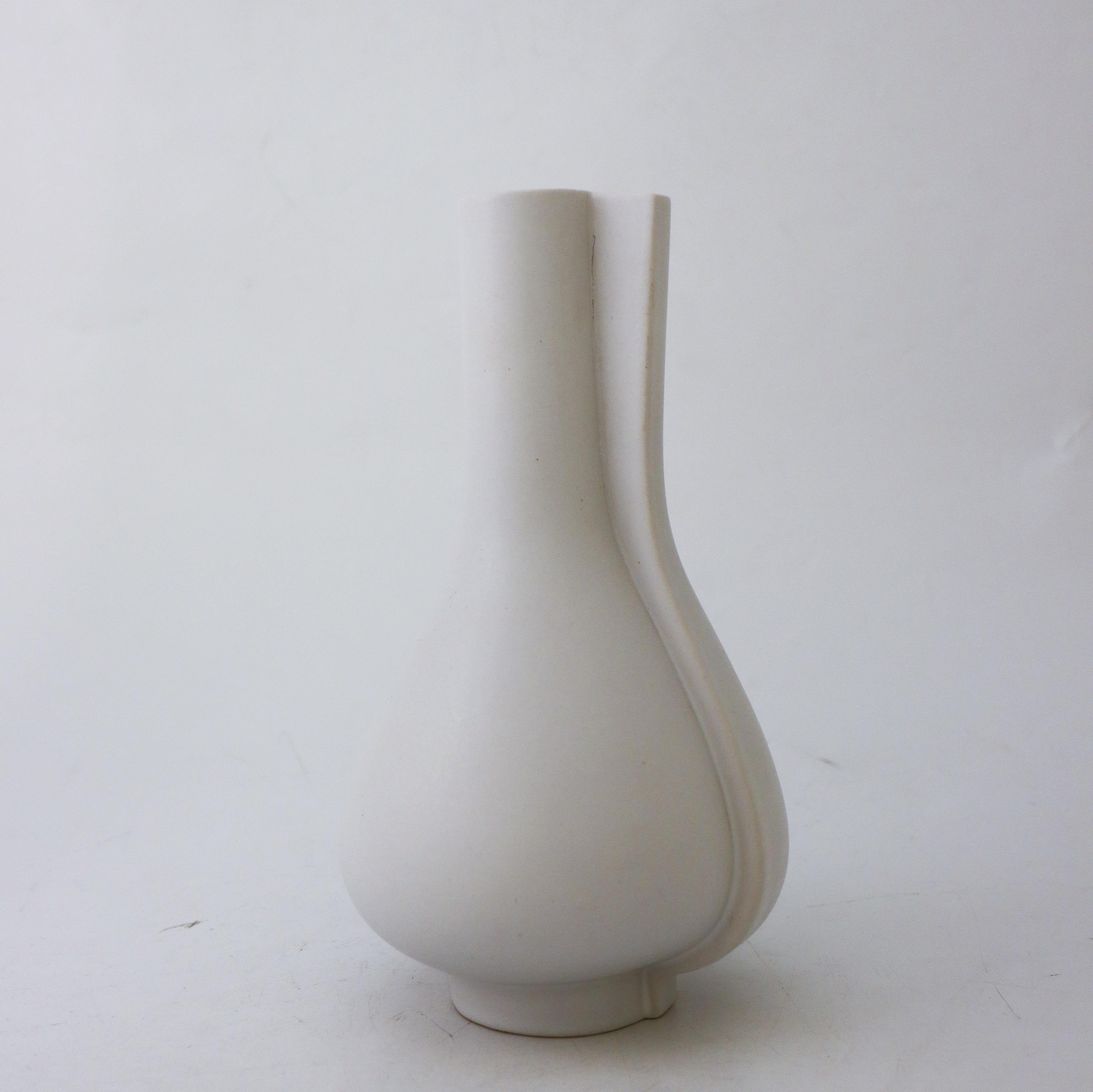 A lovely vase of model Surrea designed by Wilhelm Kåge at Gustavsberg in the 1940s. It is 23 cm high and in very good condition except from some minor scratches in the glaze. It is not marked, many of the surrea items is not marked. 

This is one of