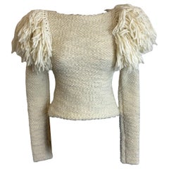 Jersey blanco con detalles en los hombros, Isabel Marant.