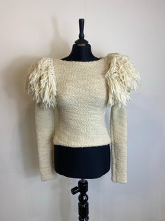 White sweater with shoulder details, Isabel Marant.