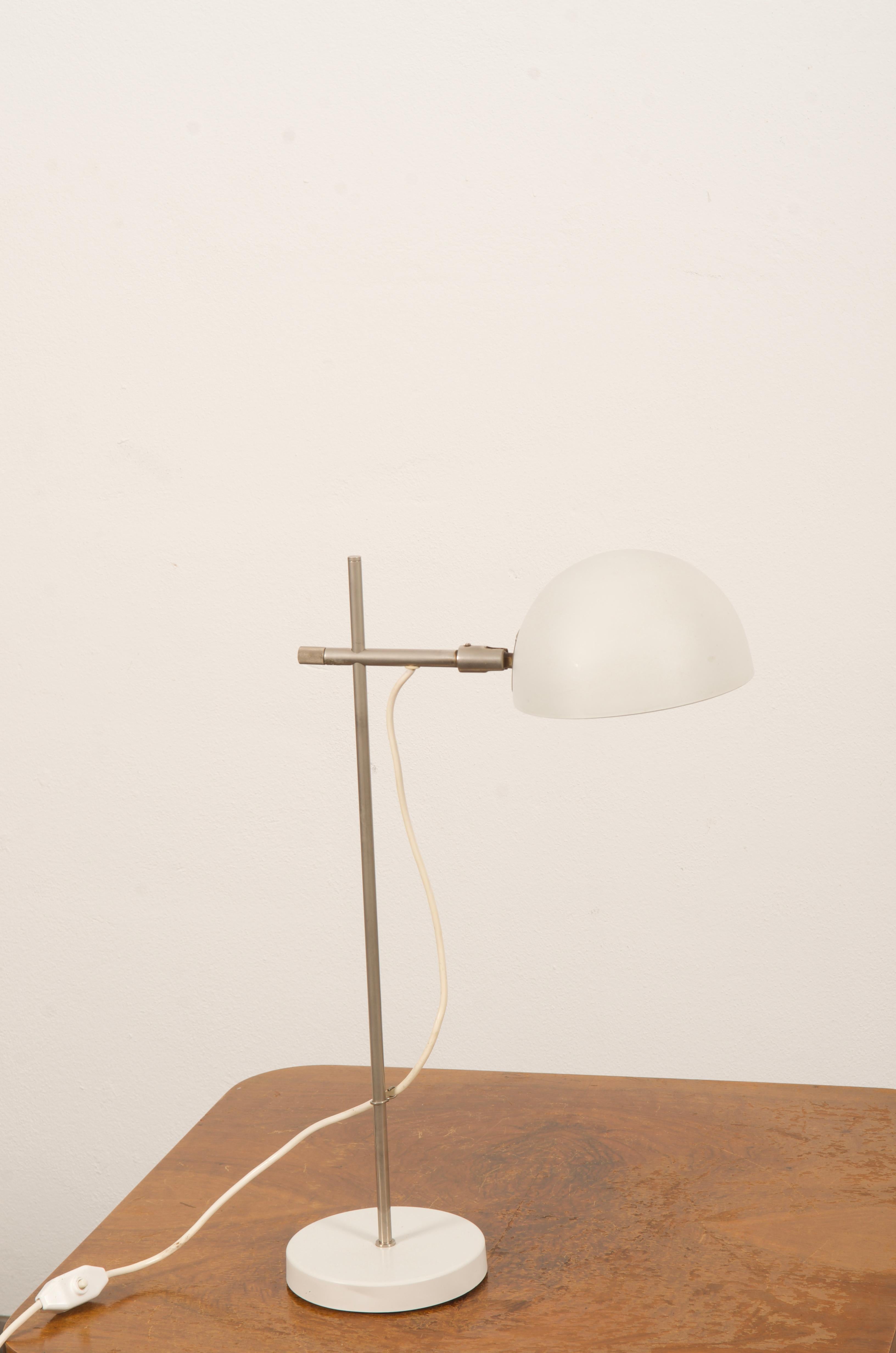 Brass construction chromed surface laquered shade and base, fitted with one E27 sockets. 
Made in Denmark n the 1970s.