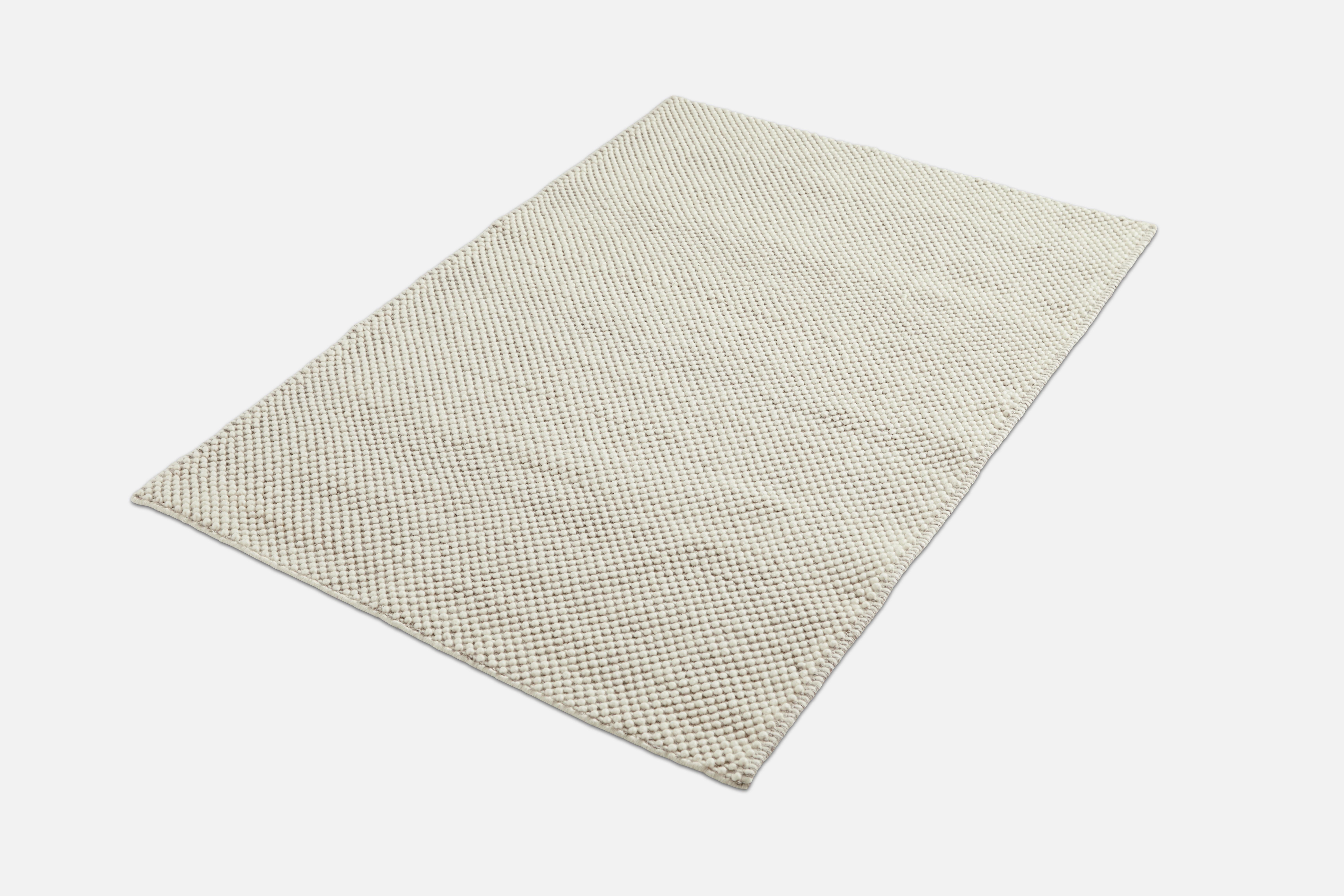White tact rug by Shazeen
Materials: 90% wool, 10% cotton.
Dimensions: W 170 x L 200 cm
Available in 3 sizes: W 90 x L 140, W 170 x L 240, W 200 x L 300 cm.
Available in off white and dark grey.

Growing up as a child experiencing the inside