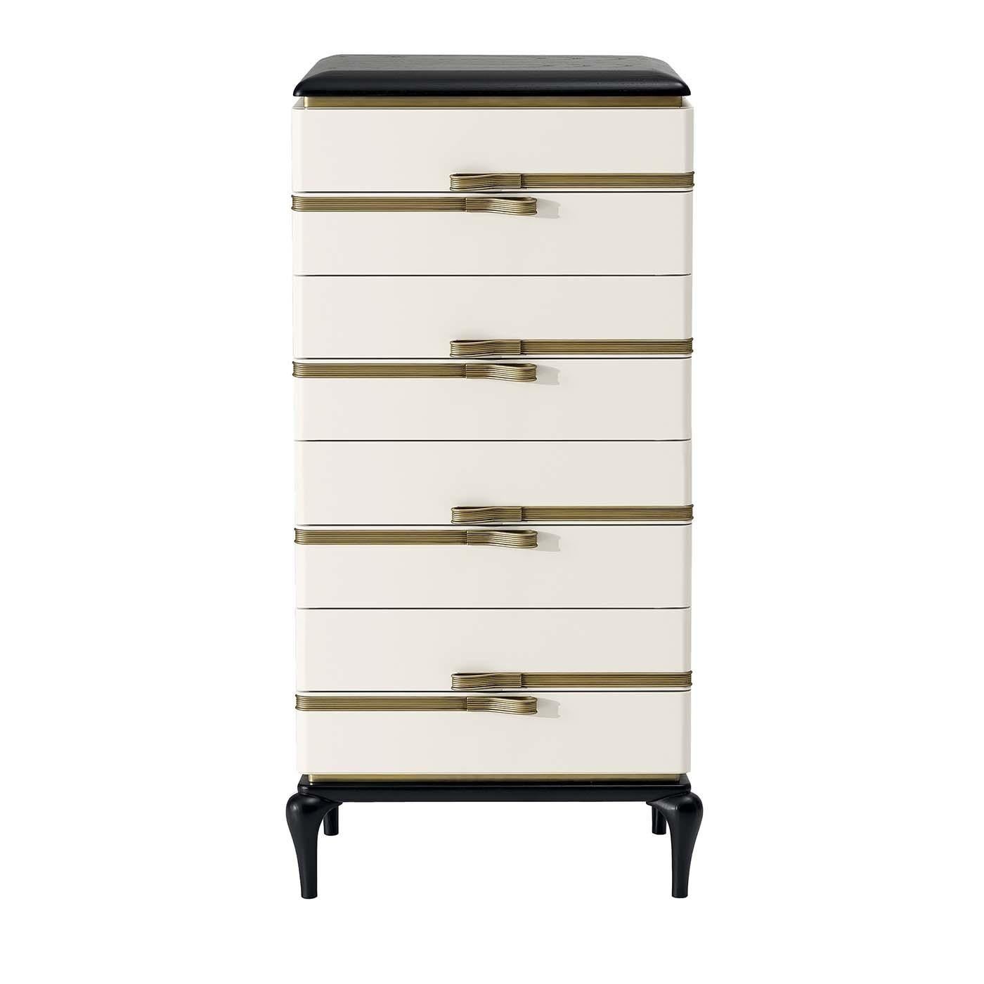 This white tall dresser will renew the look of a modern bedroom, especially when paired up with the white bedside table and a low dresser of the same designer. Boasting a white-lacquered frame of plywood and ash-veneered MDF, both base and top are
