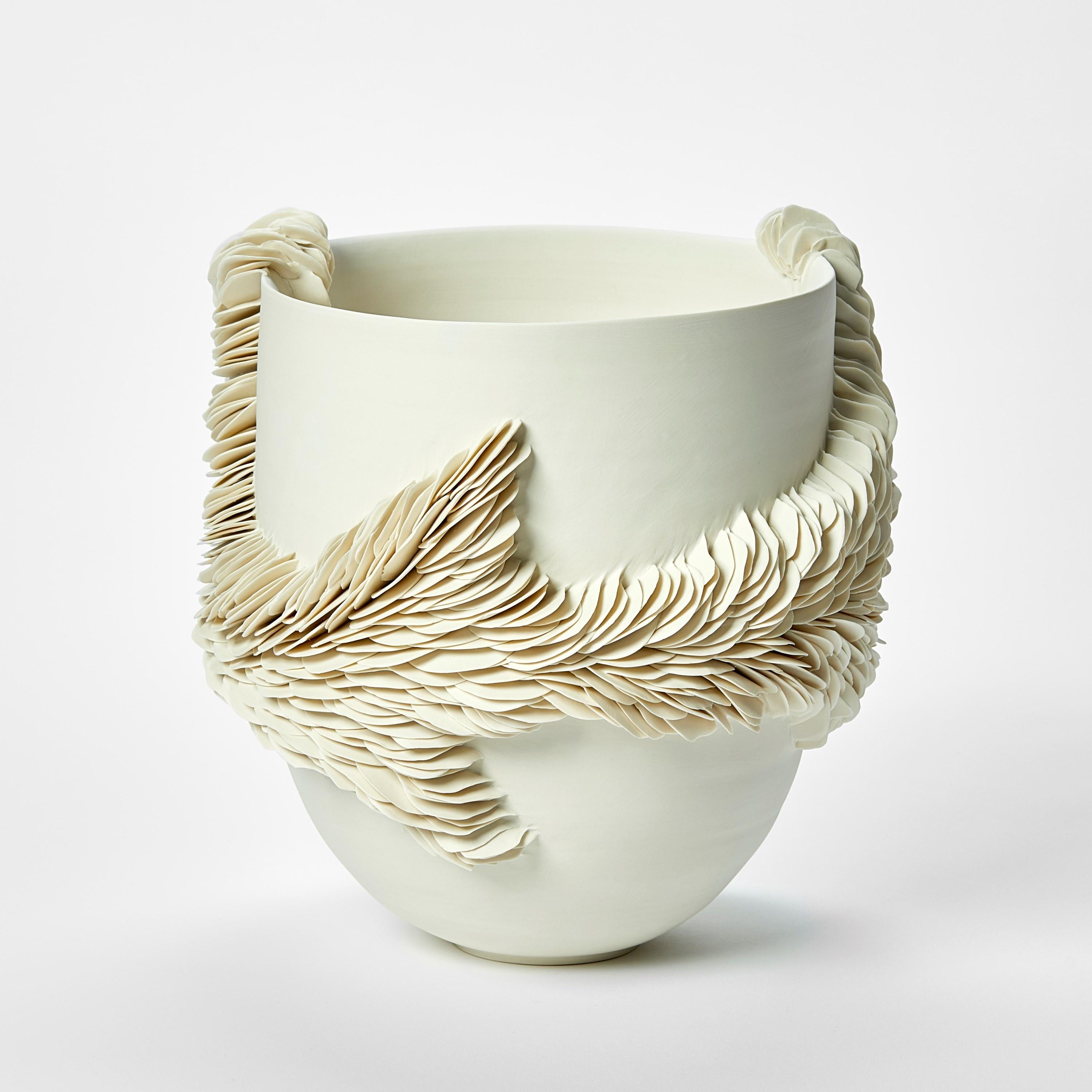 'White Tall Wrapping Bowl I' is a unique porcelain sculpture by the British artist, Olivia Walker.

Walker works in porcelain to create pieces that explore ideas of growth and decay through the construction and layering of complex surfaces.

All of