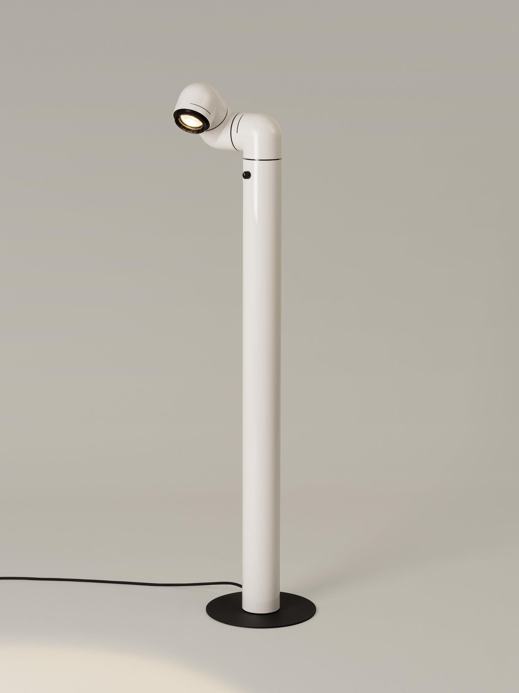 White Tatu floor lamp by André Ricard
Dimensions: D 23 x W 26 x H 116 cm
Materials: Metal, plastic.
Available in red or white.

This friendly lamp, a revolutionary milestone in design, is essential in any context, directing light wherever it is