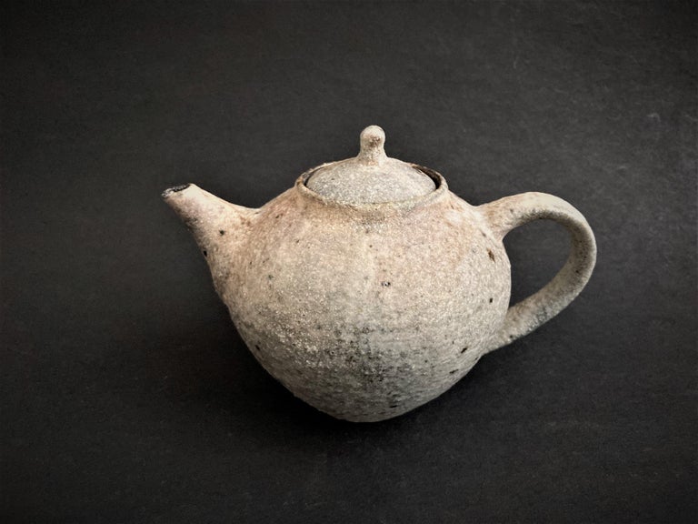 White Tea Pot by Toru Hatta
Unique Piece
Dimensions: Diameter 11 x H 12.5 cm
Material: Handmade Ceramic. 


Holds up to 600ml. 


Toru Hatta was both in Kanazawa in 1977. His love of antiques and old wares lends influence to his ancient and