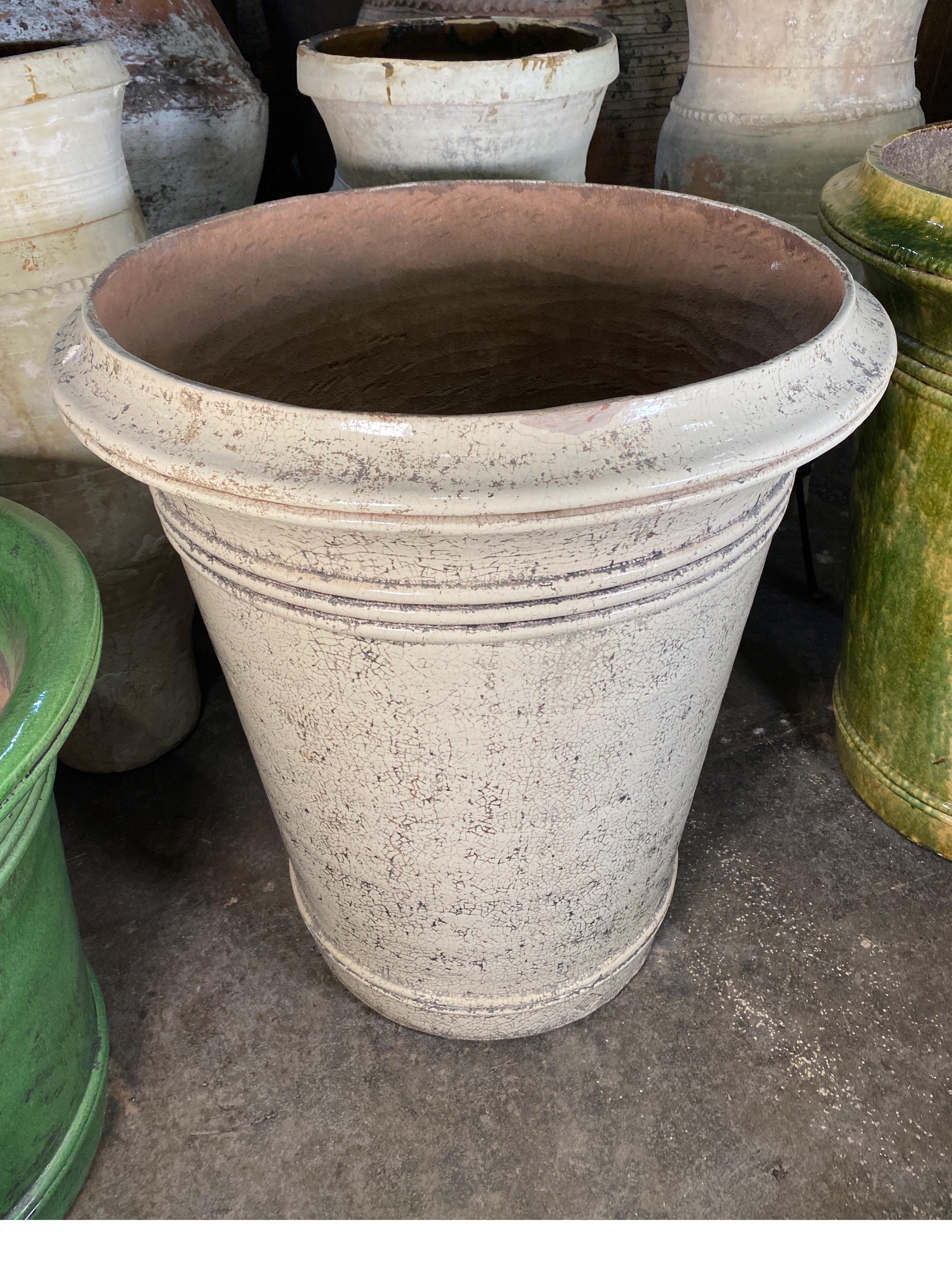 White terra cotta urn handcrafted in France.