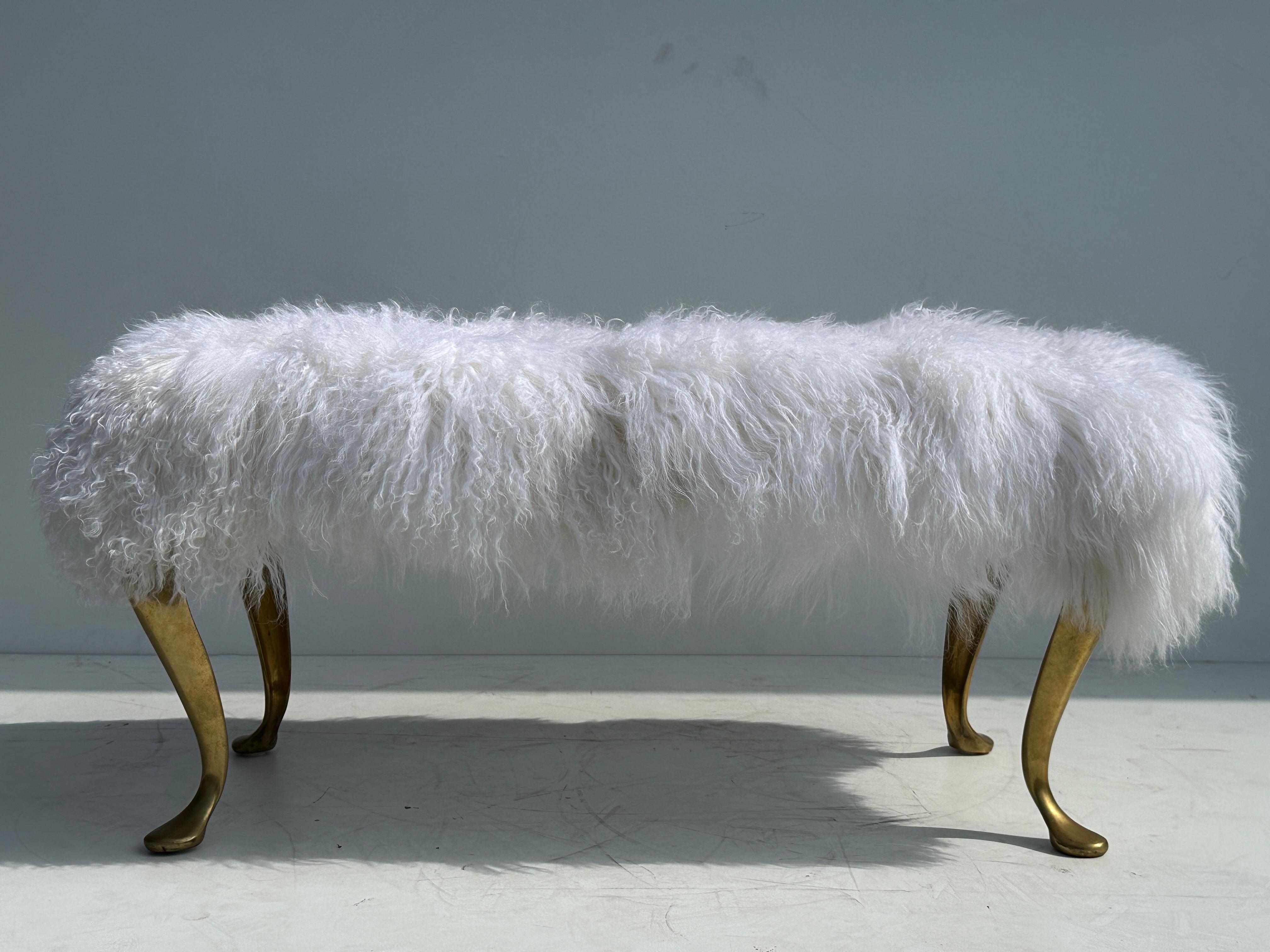 White Tibetan lambs fur bench / ottoman with brass cabriolet legs.
Brass legs are vintage Italian from 1980's. Upholstery is new.