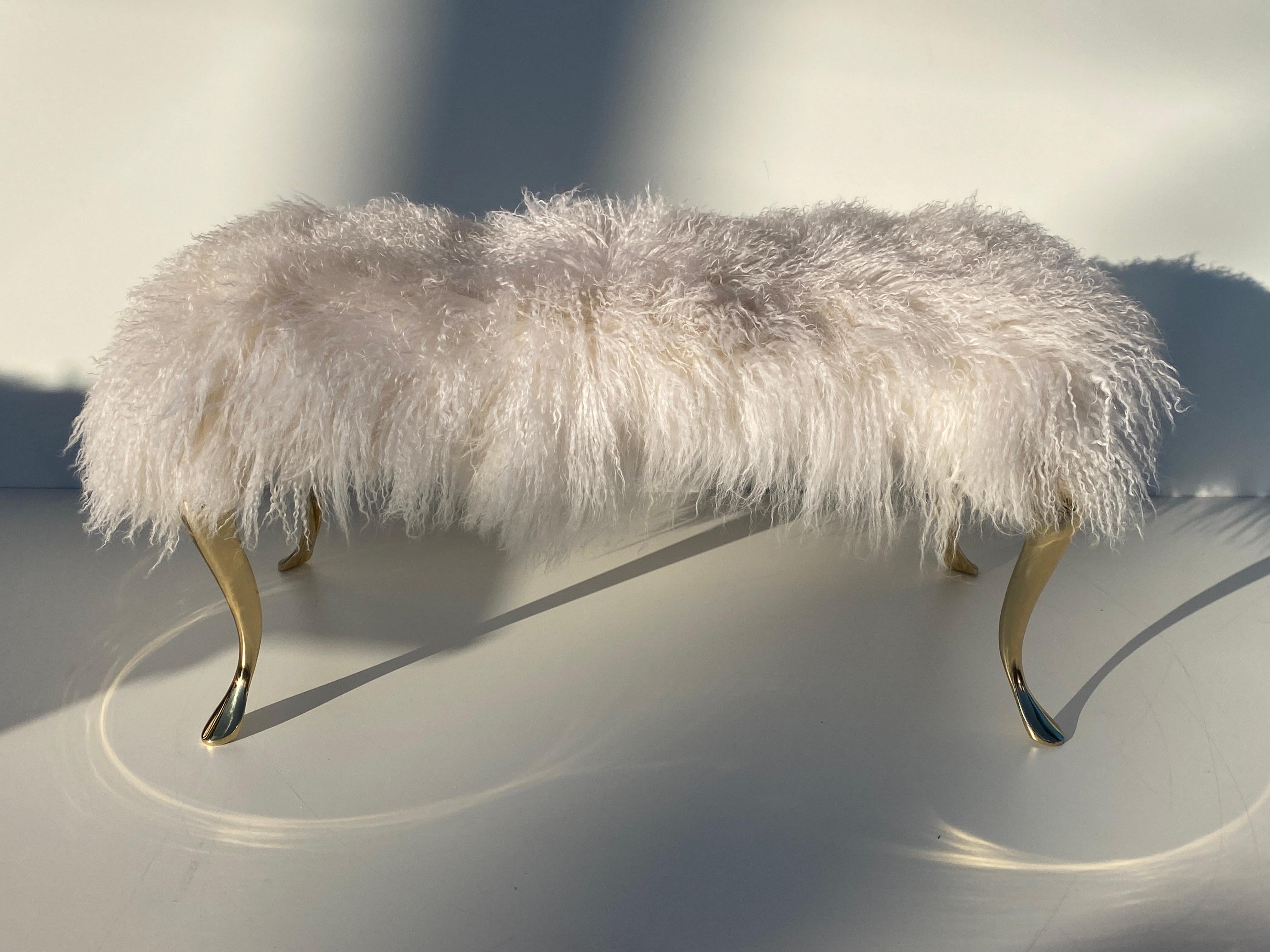 White Tibetan sheep fur bench with polished brass cabriolet legs.
Legs are vintage from 1980's, upholstery is new.