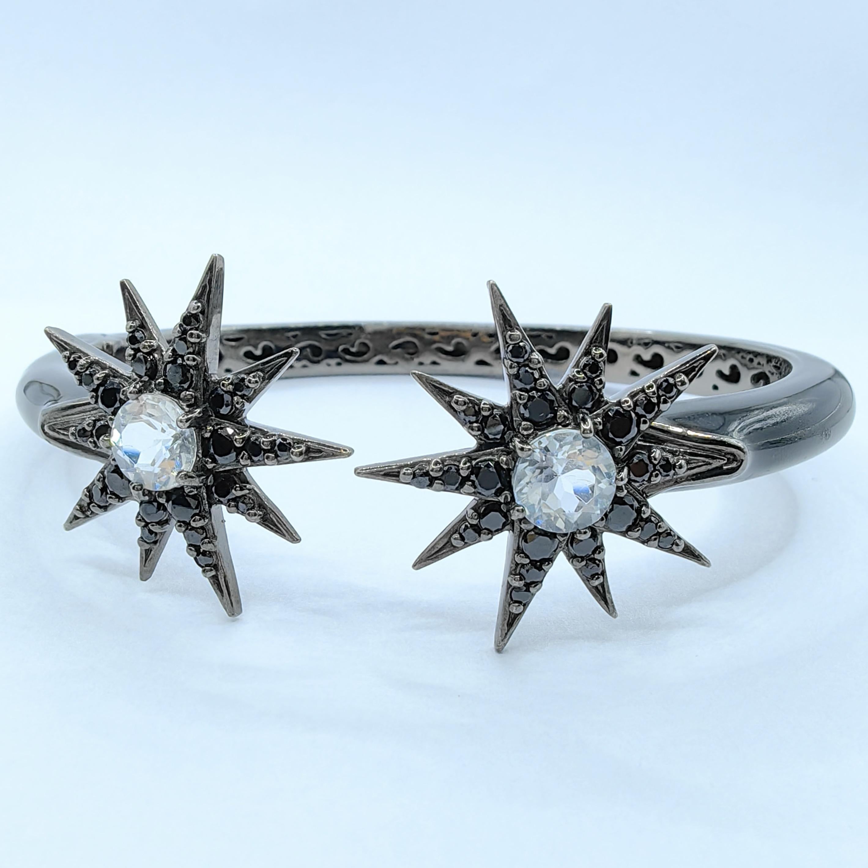 Round Cut White Topaz and Black Sapphire Starburst Motif Cuff Bracelet in Sterling Silver