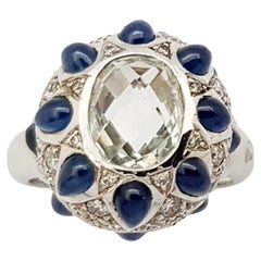 White Topaz, Cabochon Blue Sapphire with Cubic Zirconia Ring in Silver Settings