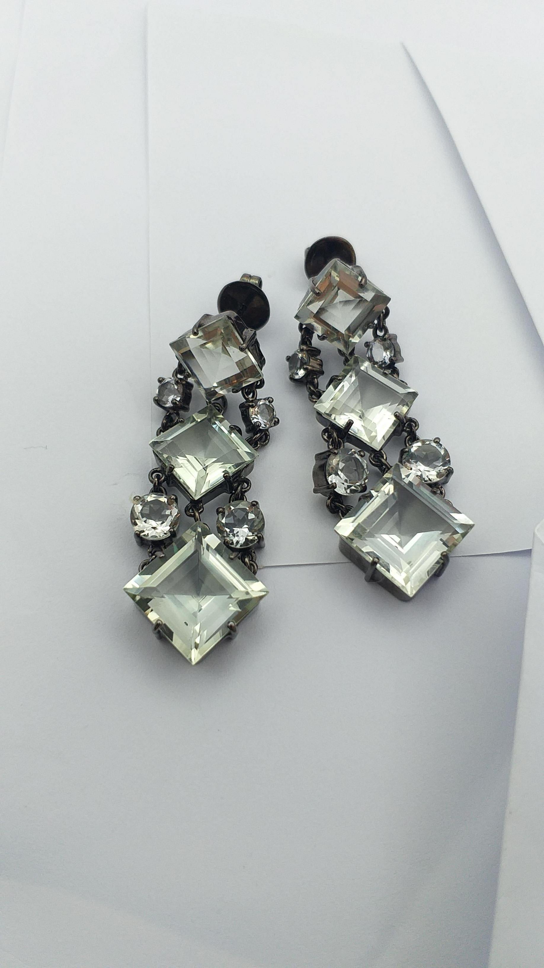 White Topaz Earrings set in Silver Settings

Width:  1.6 cm 
Length: 5.0 cm
Total Weight: 17.45 grams


*Please note that the silver setting is plated with rhodium to promote shine and help prevent oxidation.  However, with the nature of silver,