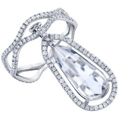 18kt White Gold Dangling Ring with Diamonds and White Topaz 
