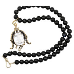 28 Ct White Topaz Pendant Pearl Enamel Yellow Gold Onyx Beads, 1890