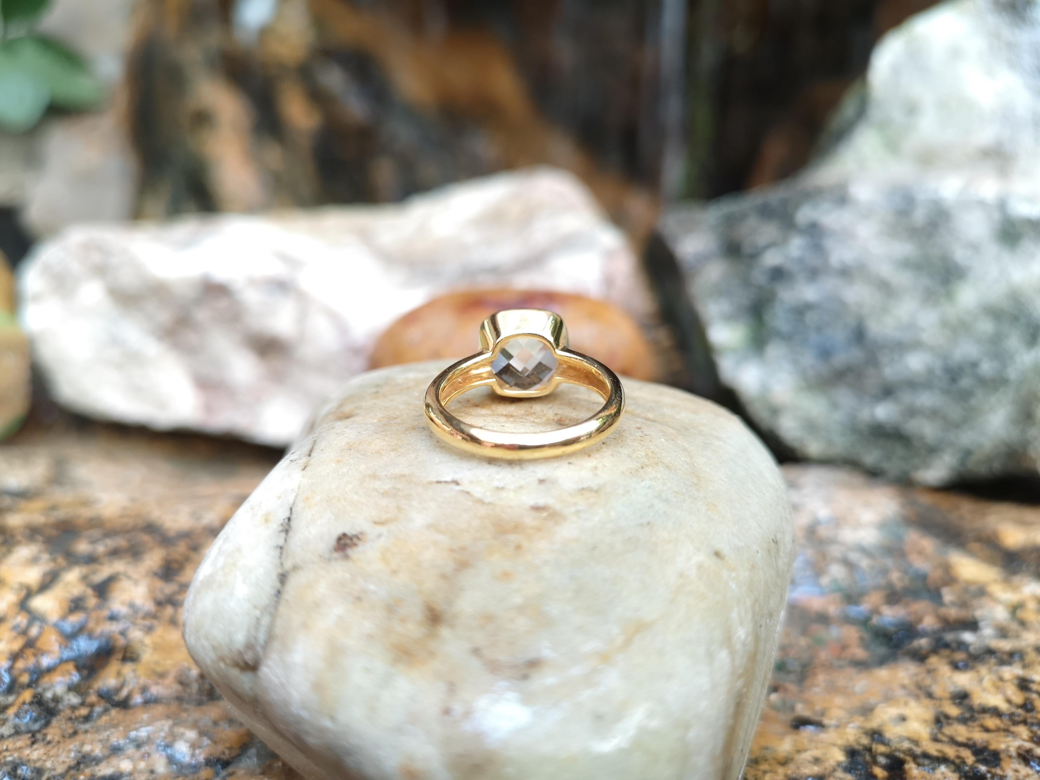 White Topaz Ring Set in 18 Karat Gold Settings 1