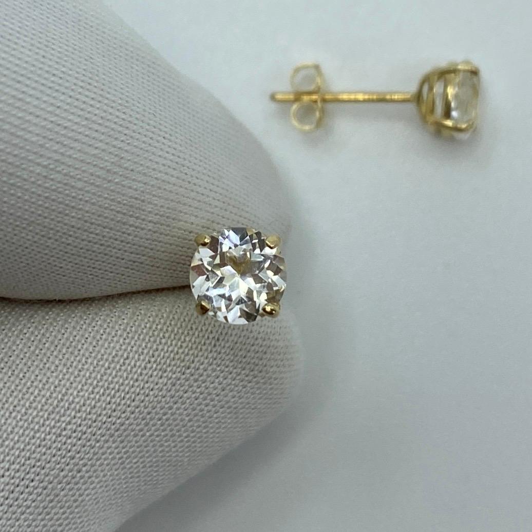 Natural 1.15 Carat White Topaz Yellow Gold Earring Studs.

Beautiful 5mm matching pair of white topaz with excellent clarity and an excellent round brilliant cut.

Set in lightweight 9k yellow gold suds with butterfly backs.

Perfect matching