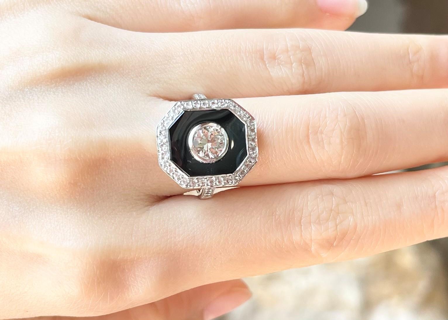 White Topaz 0.90 carat, White Sapphire 0.62 carat and Black Agate Ring set in 18K White Gold Settings

Width:  1.5 cm 
Length: 1.8 cm
Ring Size: 54
Total Weight: 7.75 grams

