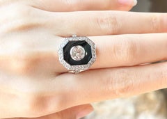 Anello con Topazio bianco, Zaffiro bianco e Agata nera incastonati in oro bianco 18 carati