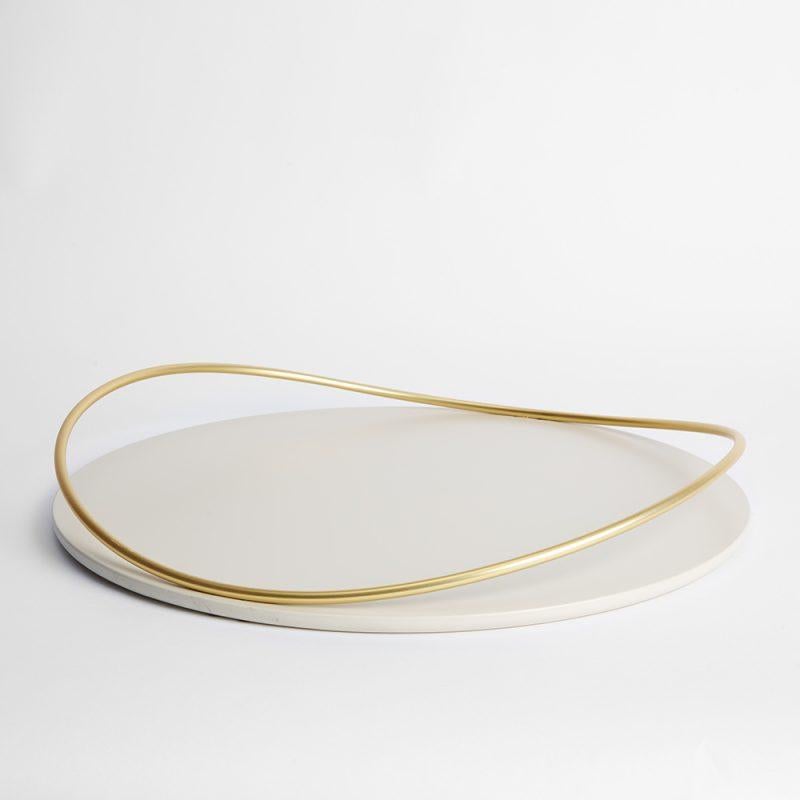 White Touché E Tray by Mason Editions
Dimensions: D 48 × 7 cm
Materials: Iron and MDF
Colours: taupe, cotton, burgundy, sage green, petrol green

A light metal rod that rests on the surface and then lifts up, almost touching the surface with a