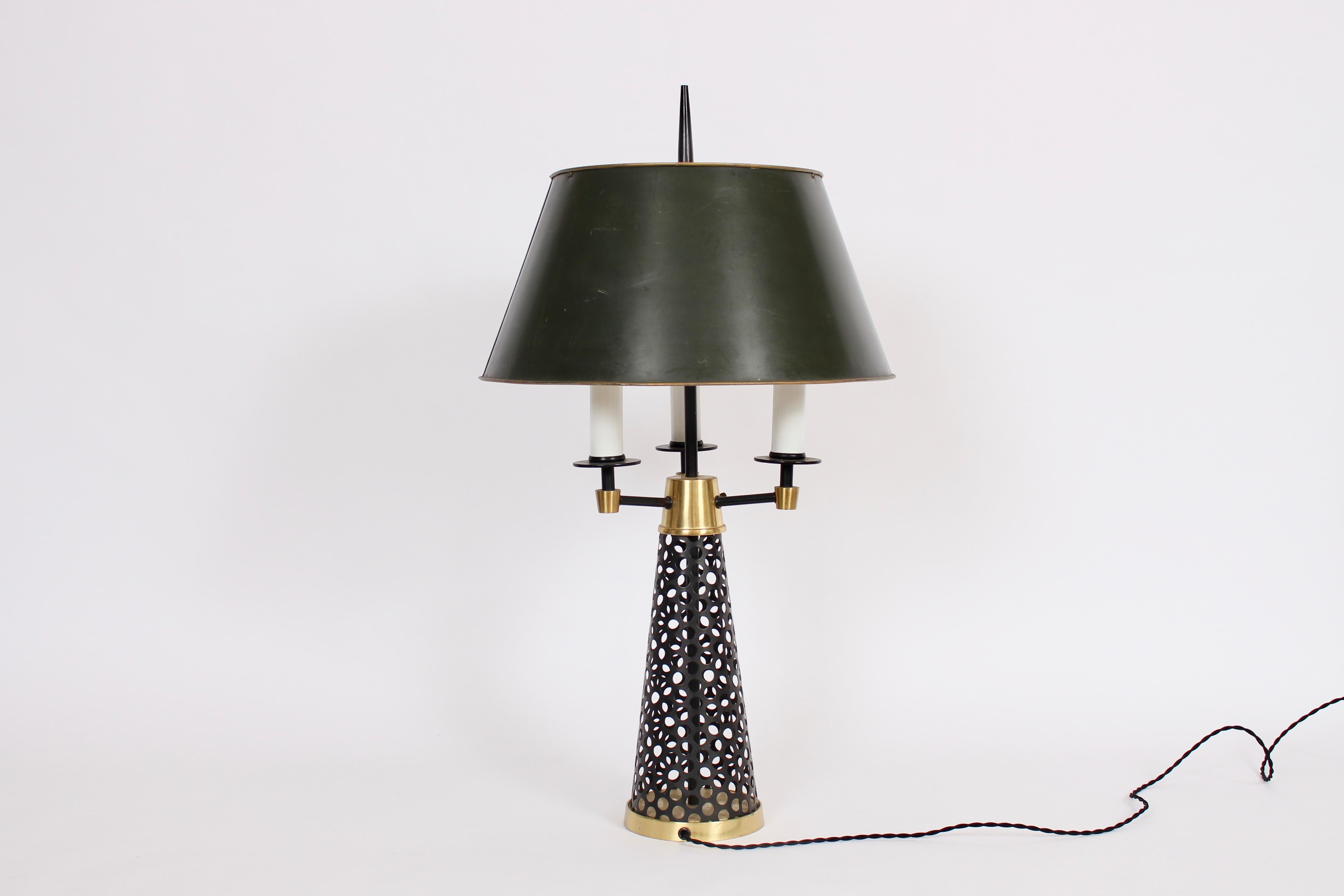 Tall perforated Black Cone, Three Candlestick & Brass Table Lamp, 1950's. In the manner of Tony Paul.  Featuring a black enameled perforated cone framework, 3 white wrapped candlesticks with bright brass cap, arms and base. Three standard sockets.